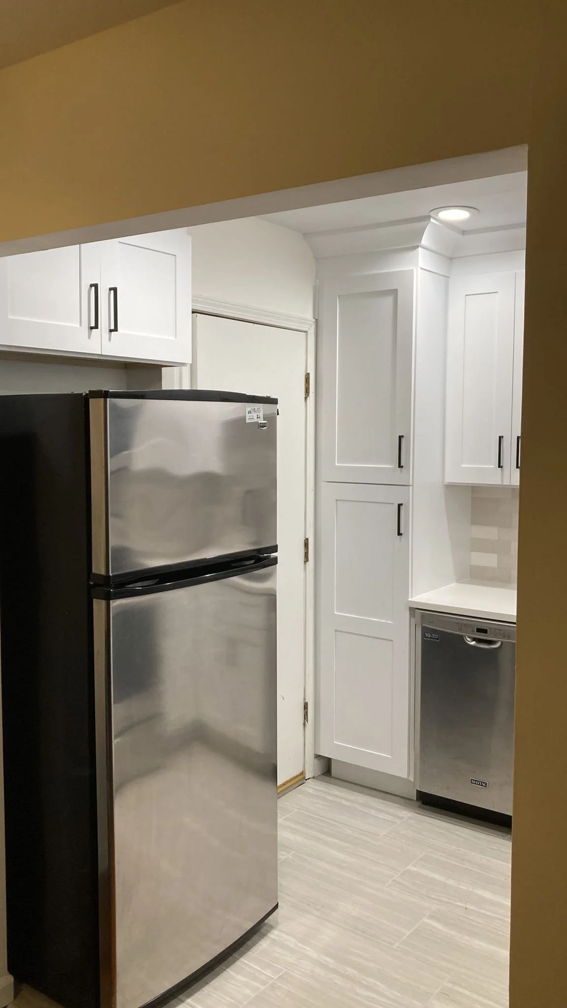 kitchen remodel, cabinet remodel, cabinet installation, kitchen renovation, remodeling service, neutral kitchen, neutral backsplash, interior design services, realtors, shaker cabinets, black matte hardware, countertop installation, custom countertop