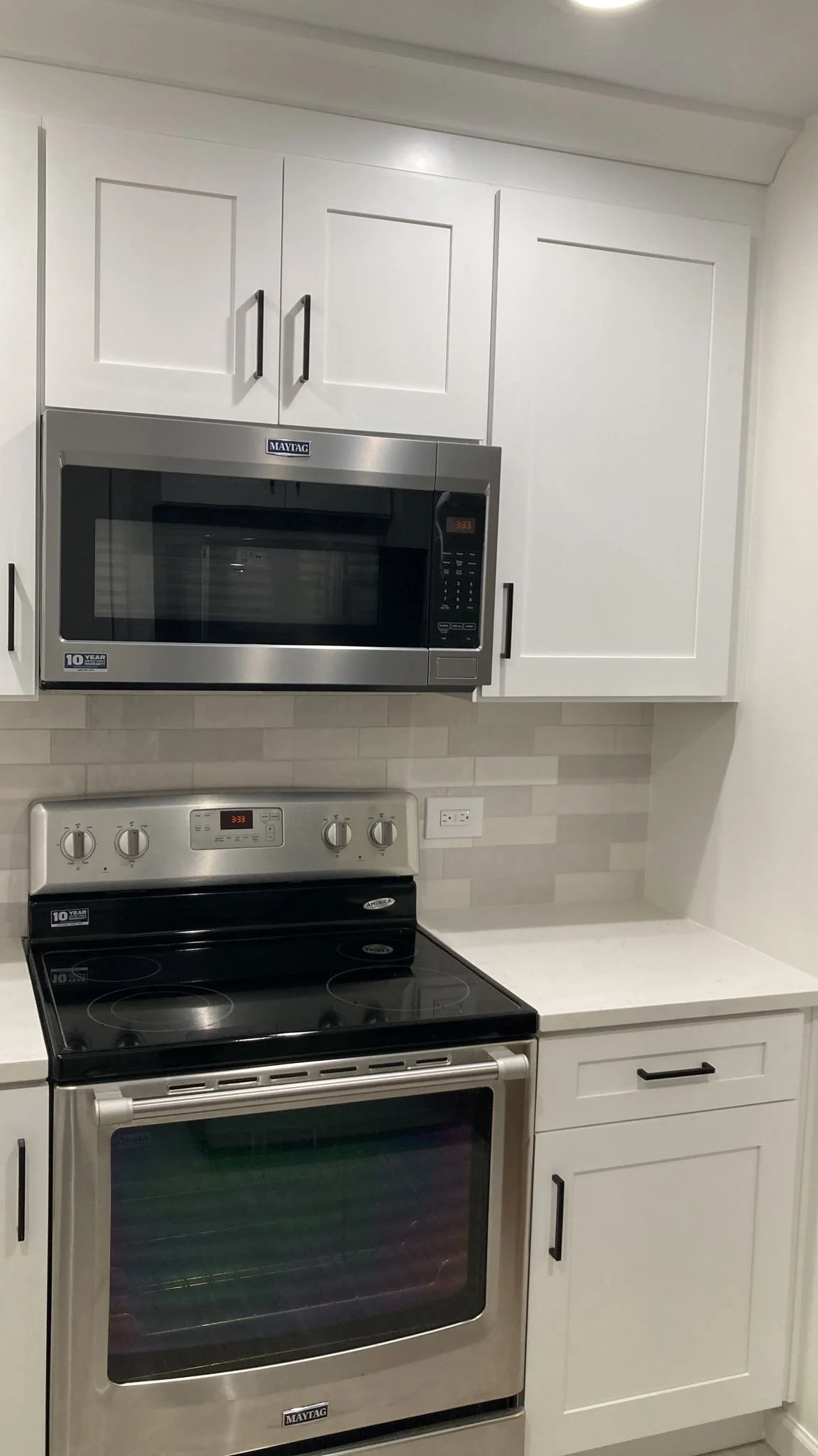 kitchen remodel, cabinet remodel, cabinet installation, kitchen renovation, remodeling service, neutral kitchen, neutral backsplash, interior design services, realtors, shaker cabinets, black matte hardware, countertop installation, custom countertop