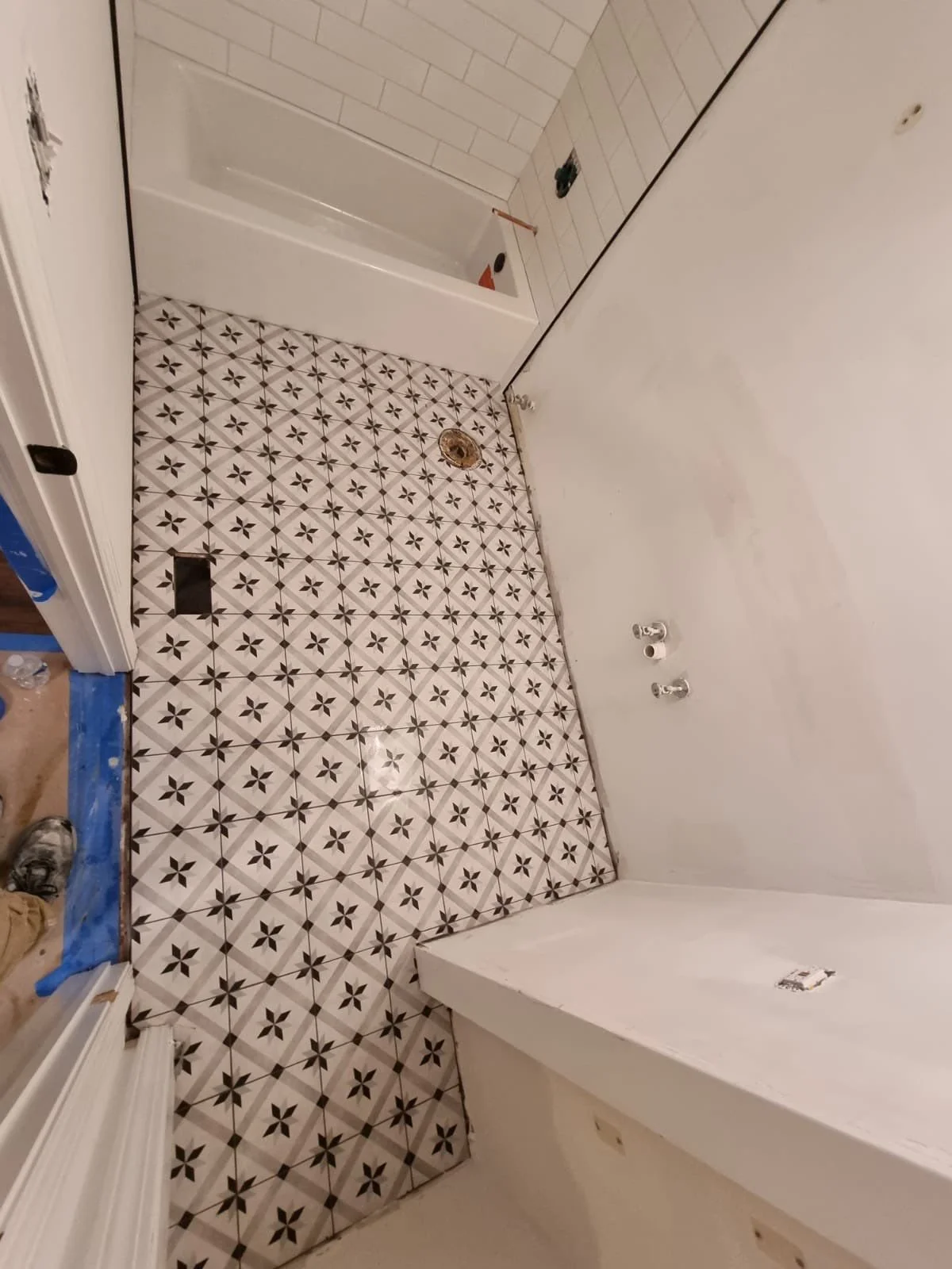 water damage restoration, bathroom restoration, bathroom renovation, bathroom remodel, tile installation, bathroom floor tile, pattern tile ideas, water damage company, water damage services, bathroom water damage, pipe burst restoration, neutral bat