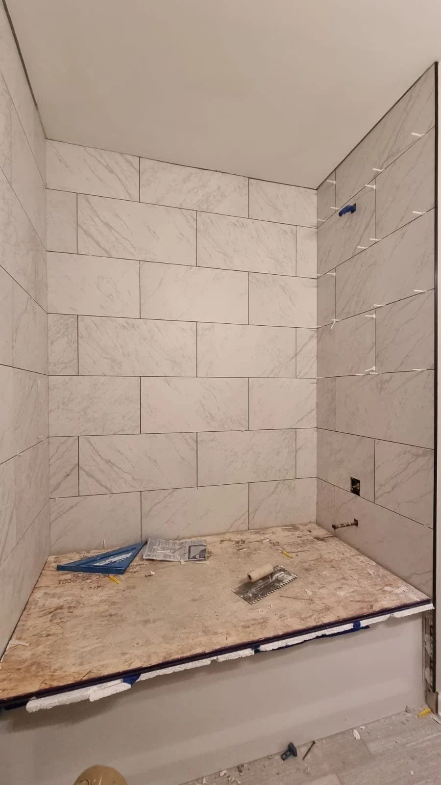 bathroom remodel, mold remediation, bathroom renovation, tile installation, interior design, general contractor, bathroom ideas, remodeling services, mold restoration services, rebuild services, bathroom repair, neutral tile ideas, shower tile ideas