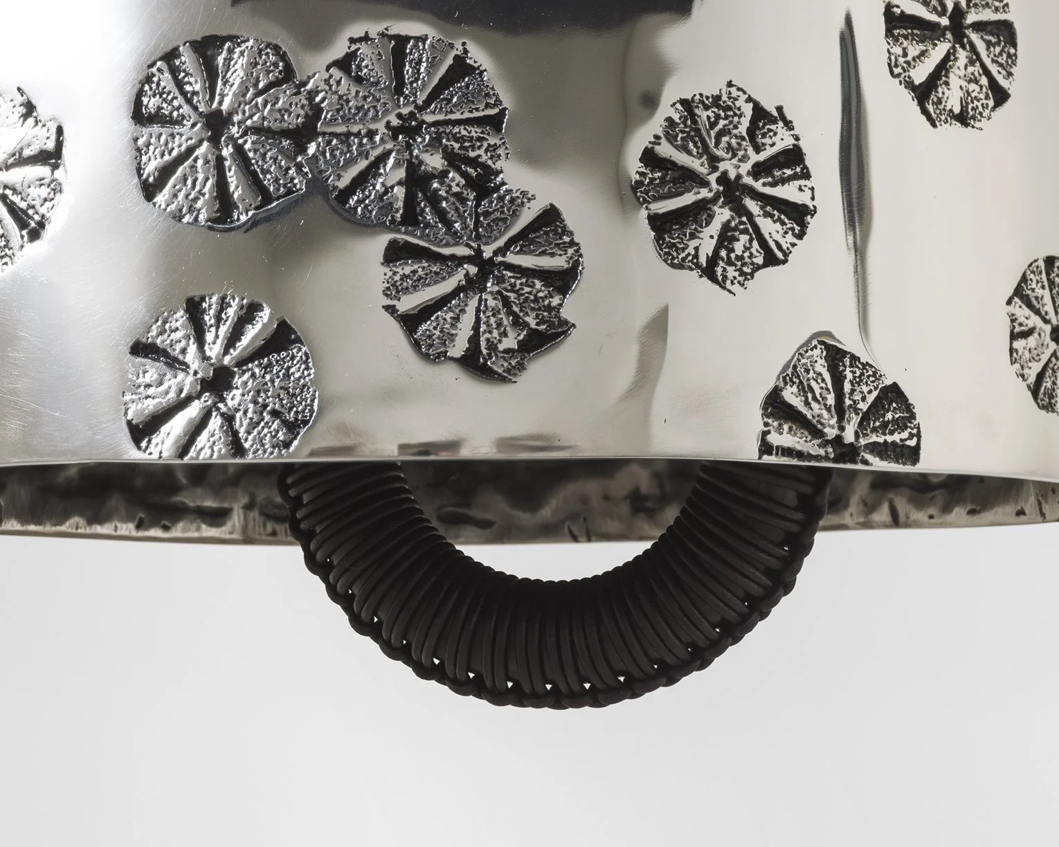 Davina Semo, Bloom (Detail) , 2022, Polished stainless steel bell, polished stainless steel and powder coated stainless steel hardware, leather wrapped patinated solid bronze clapper, hemp shibari rope, and powder coated galvanized steel chain, Bel