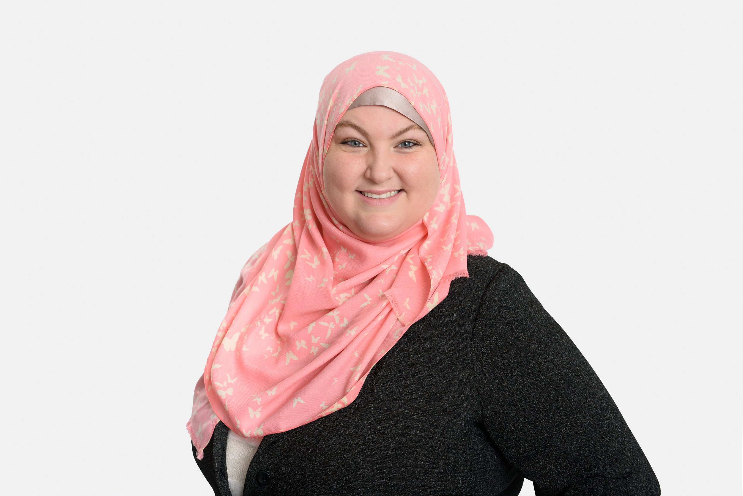 Professional headshot of woman wearing hijab