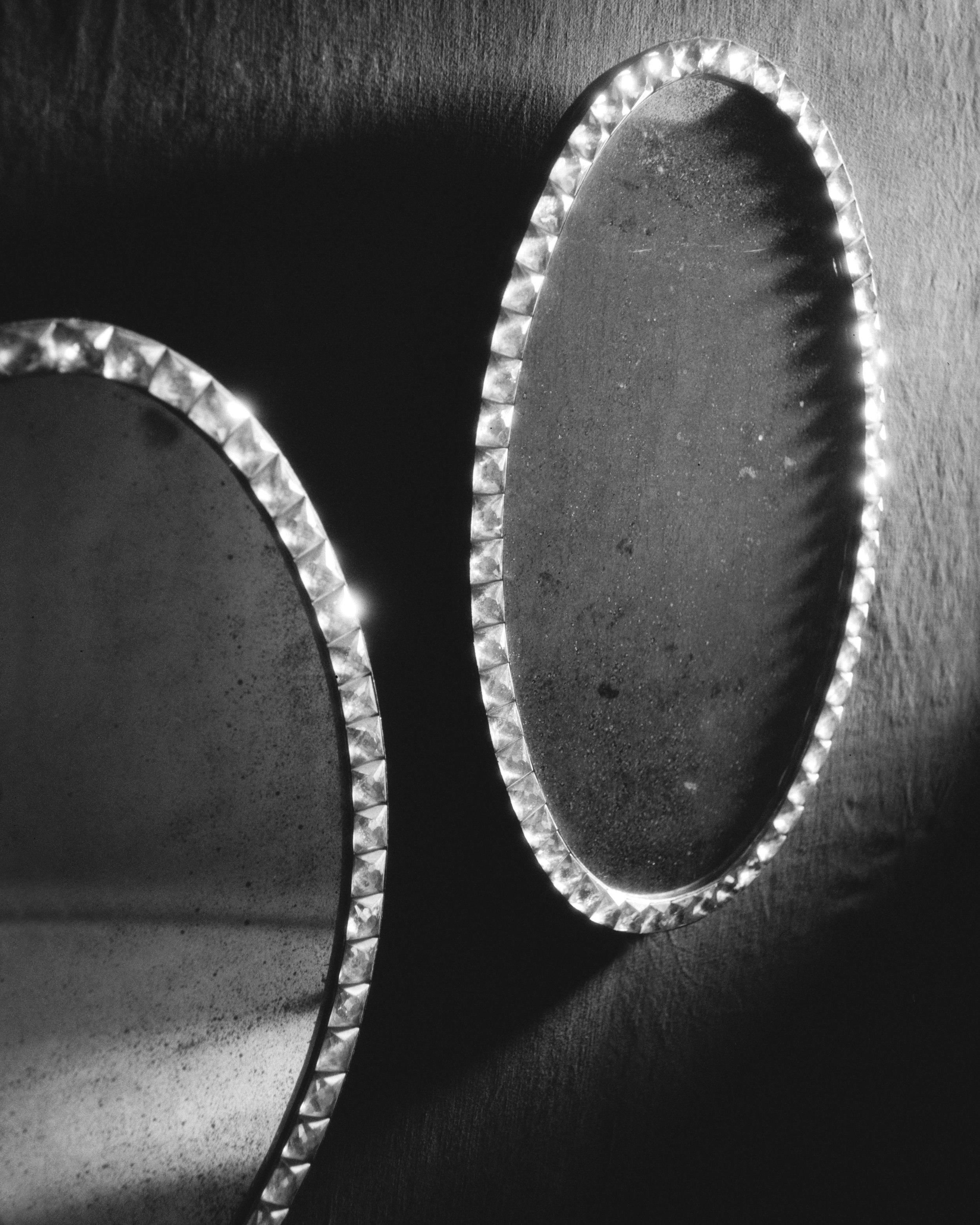 Molly Alexander Mirrors A Pair of Irish Oval Cut Glass Mirrors.jpg