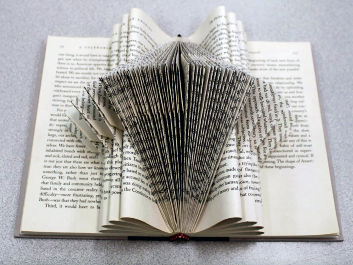 Open Book with Geometric Design