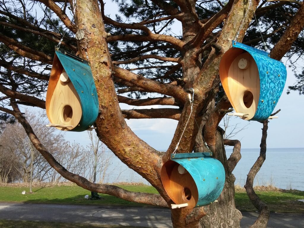 The Ultimate Bird Feeder with its verdigras copper roof and natural cedar.