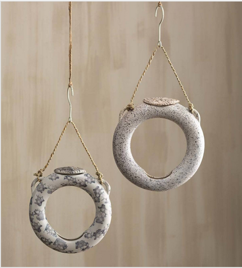 The Ceramic Ring Bird Feeder would be a welcome addition to any woodland garden.