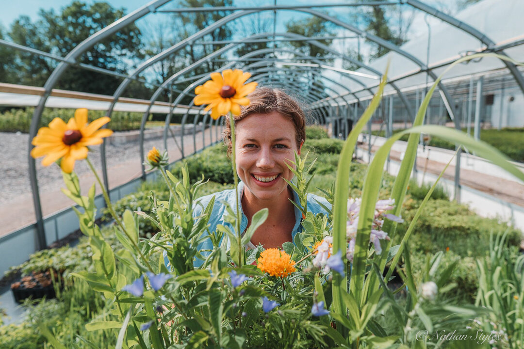 Reyna Matties with a selection of native wildflowers from the ONP greenhouses.
