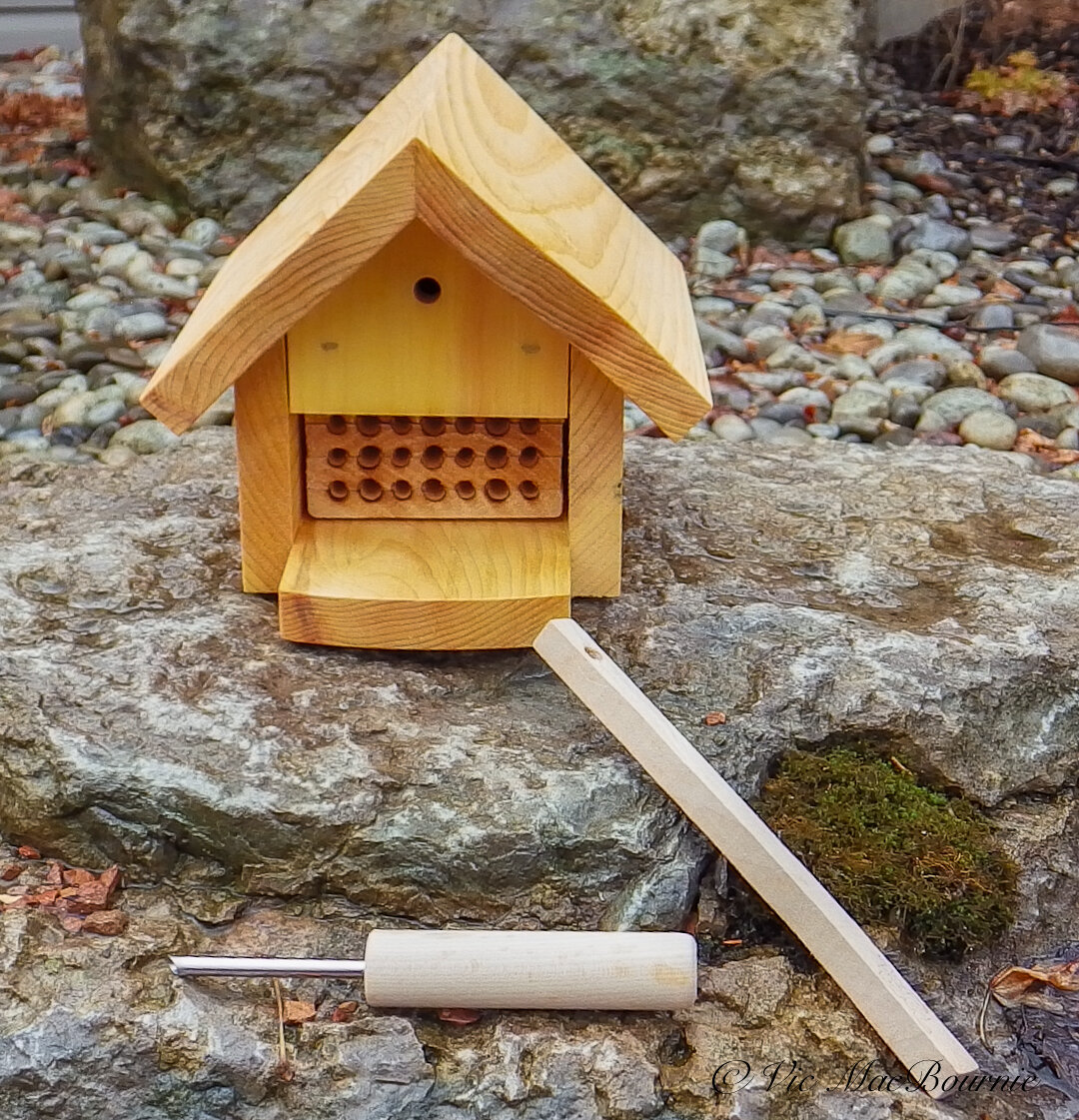 WeeBeeHouse with cleaning tools that are provided with the purchase of a bee house along with extensive instructions.