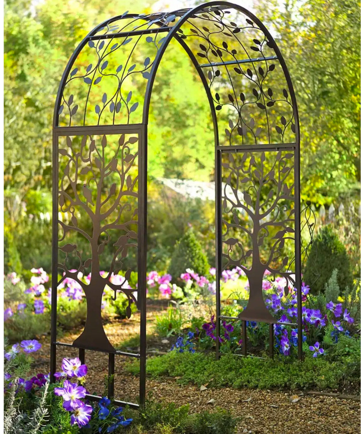 The Tree of Life arbor is an impressive, well made arbor that fits peerfectly into a woodland garden.