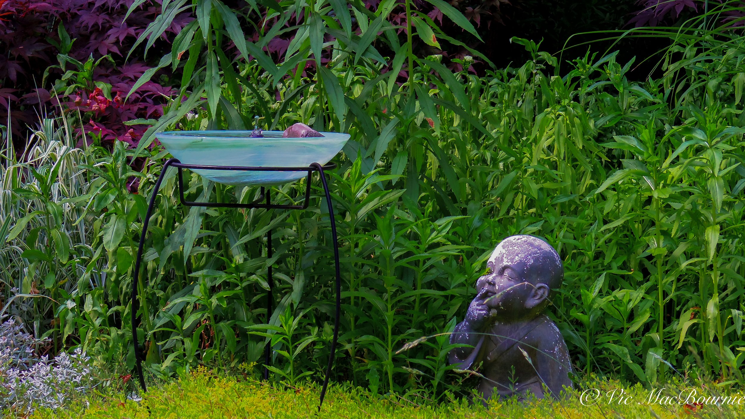 Garden statuary and our home made bird bath