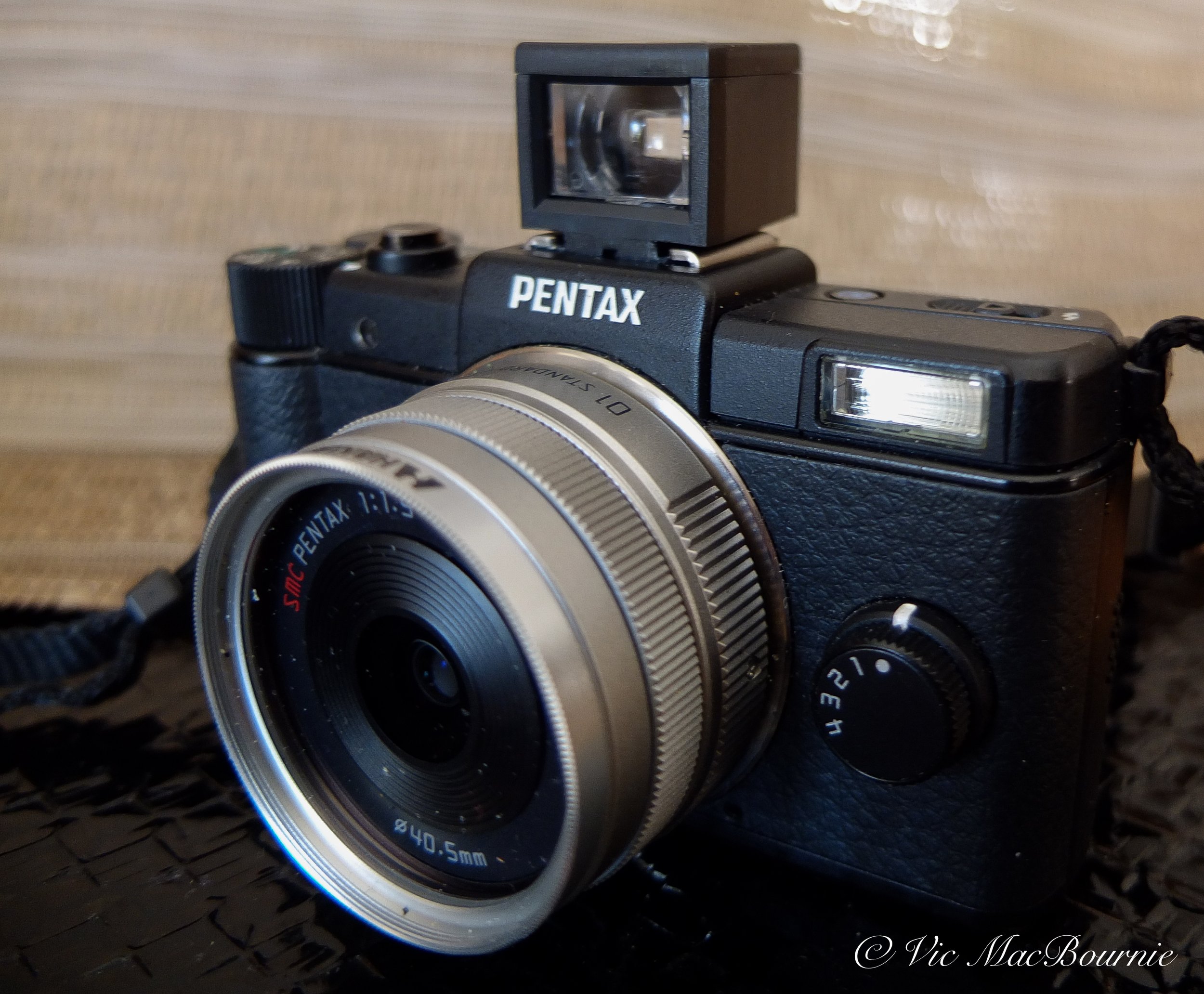 The tiny Lichifit 28mm external viewfinder works well on the Pentax Q.