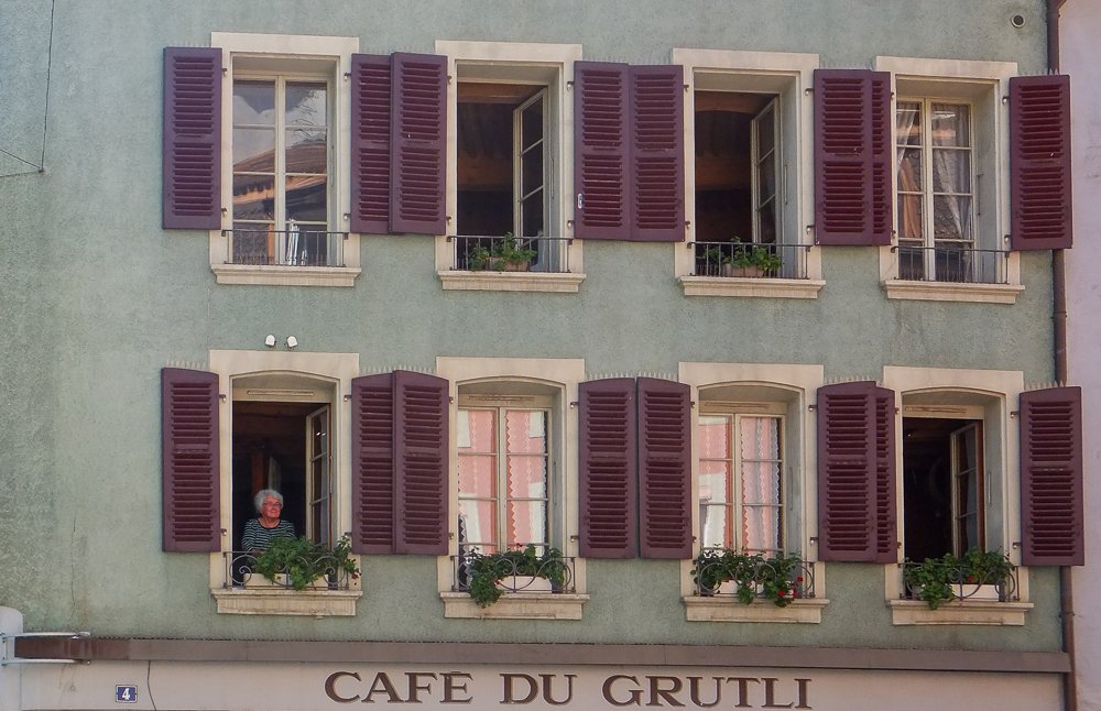 A woman peers out the window in this scene taken with the Fujifilm F660EXR