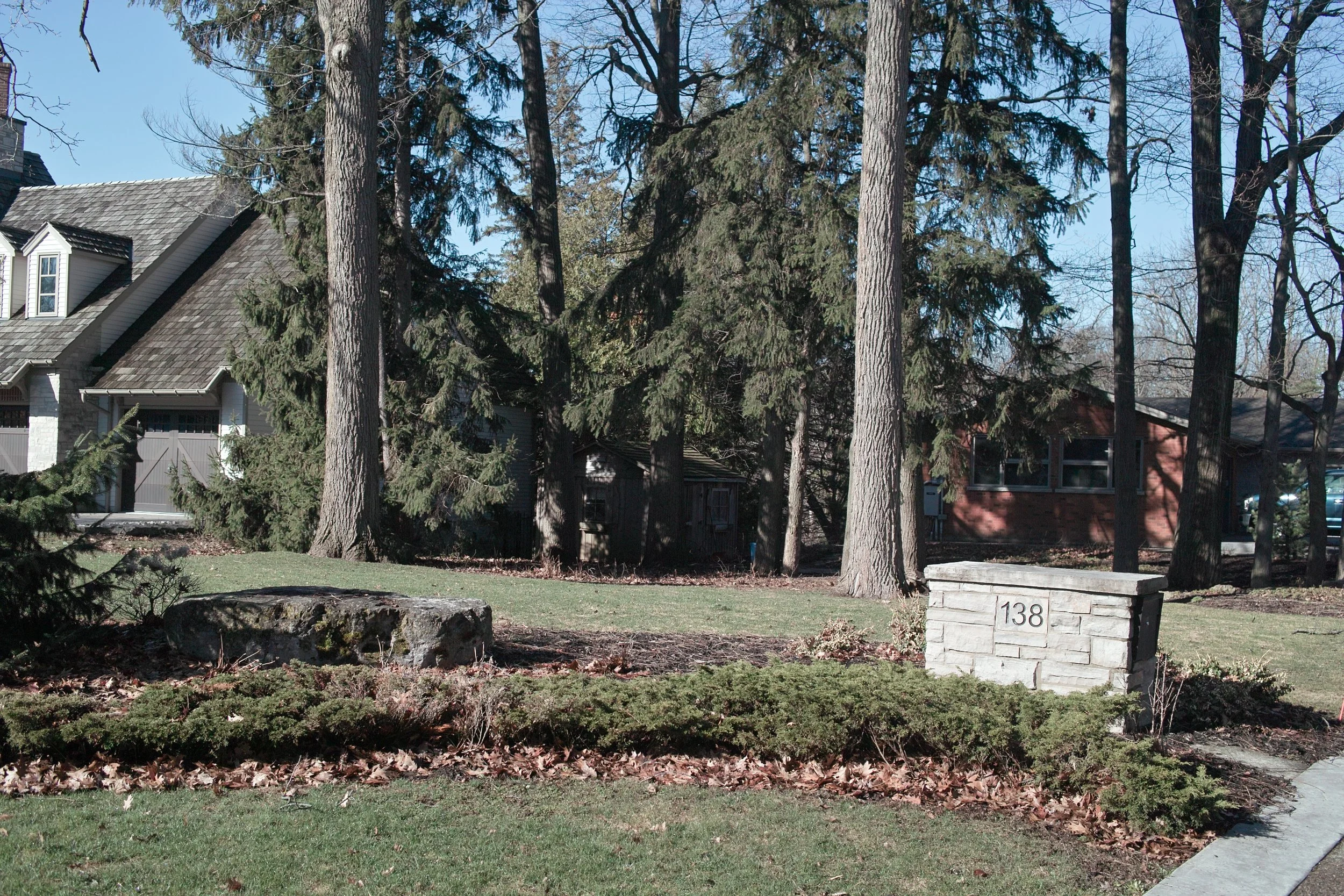stone knee wall in rustic garden
