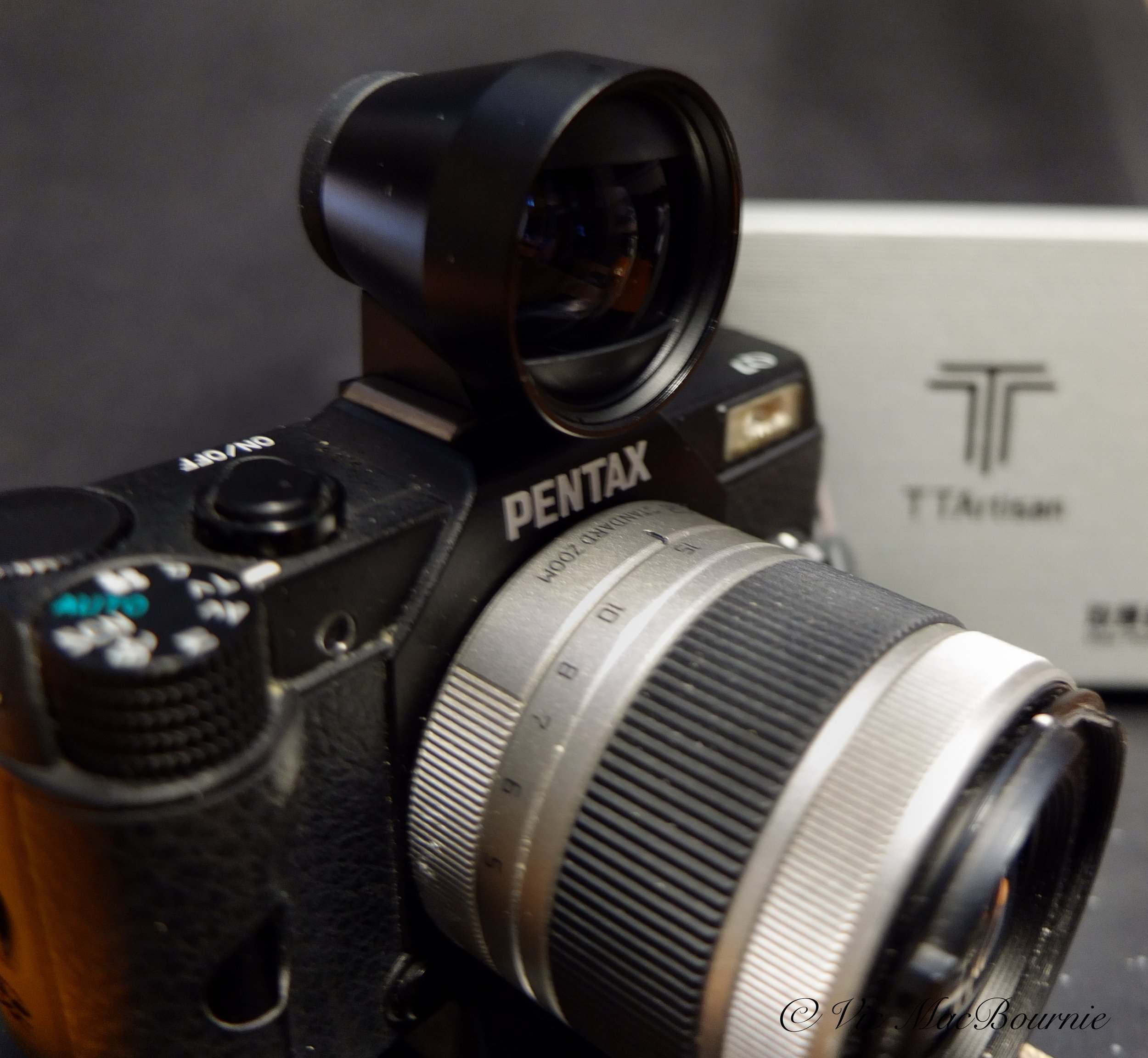 Pictured is the TTArtisan viewfinder paired with my Pentax Q miniature camera