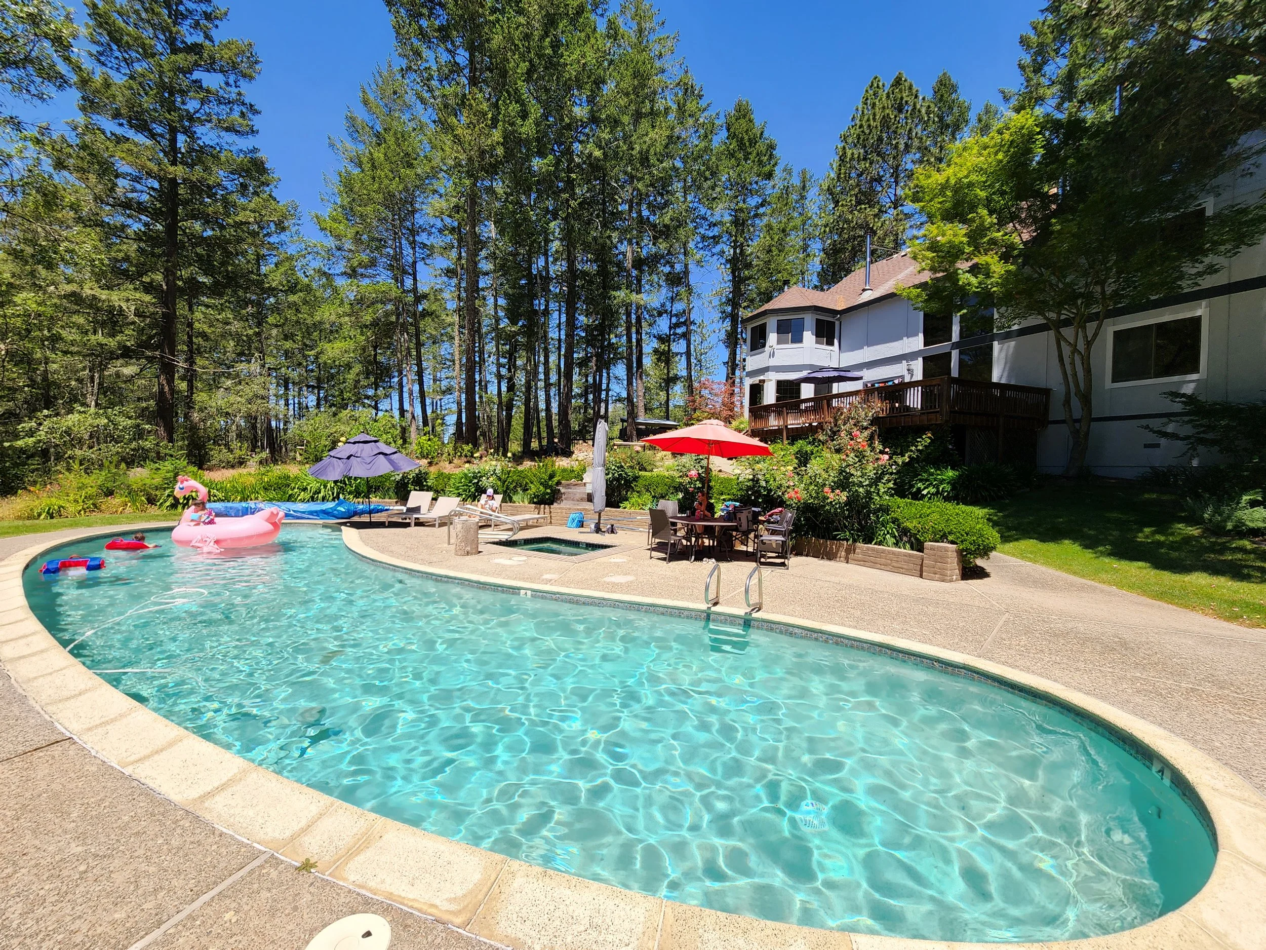 POOL WITH UMBRELLAS