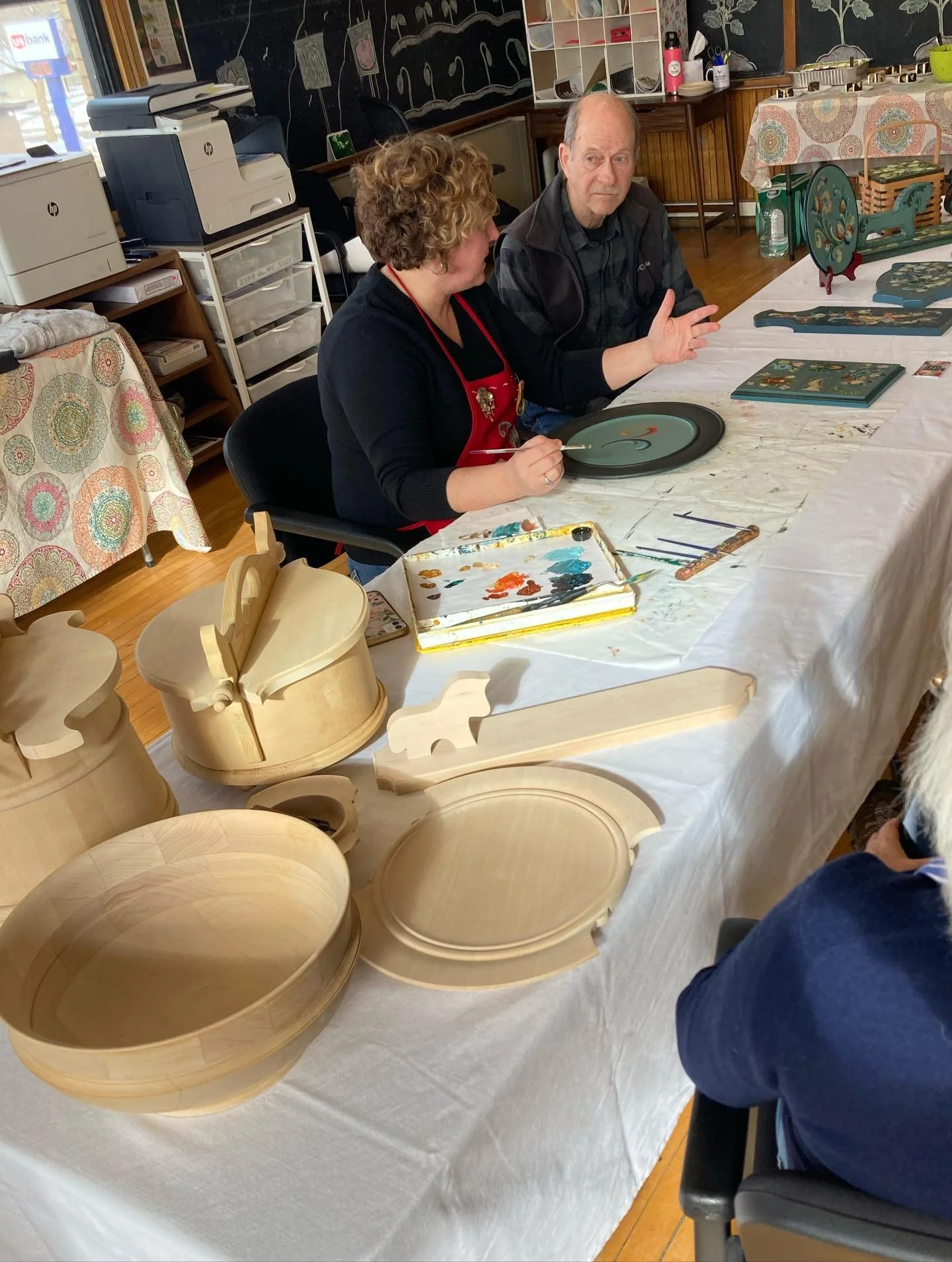 We are OPEN for First Friday until 7pm featuring Michelle Carlson and her beautiful Rosmaling work! Stop in to enjoy a demonstration, her wonderful art, as well as cake and coffee. 🍰☕️ 
Take advantage of the peeks of sun and the clear roads while we