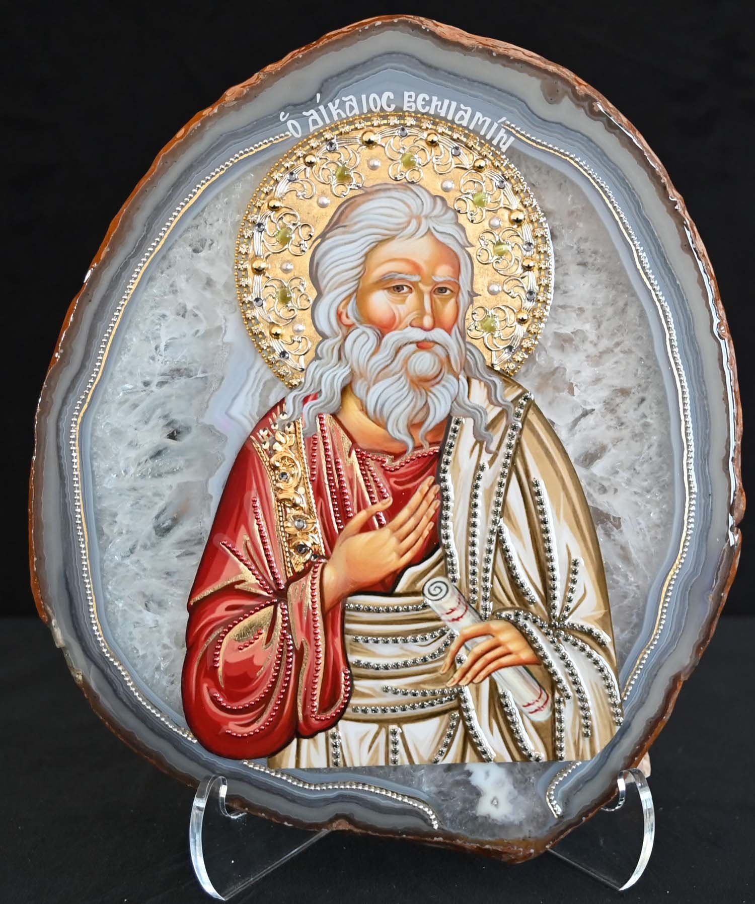 #AG6 RIGHTEOUS BENJAMIN, SON OF JACOB $185
DESCRIPTION: This icon is mounted on a Brazilian Agate Slice with natural chestnut, grey-blue banding and quartz middle (9 x 10 ¼ x 1/8) 21 lbs. His garments are enhanced with hand-gilded gold, gold metal s