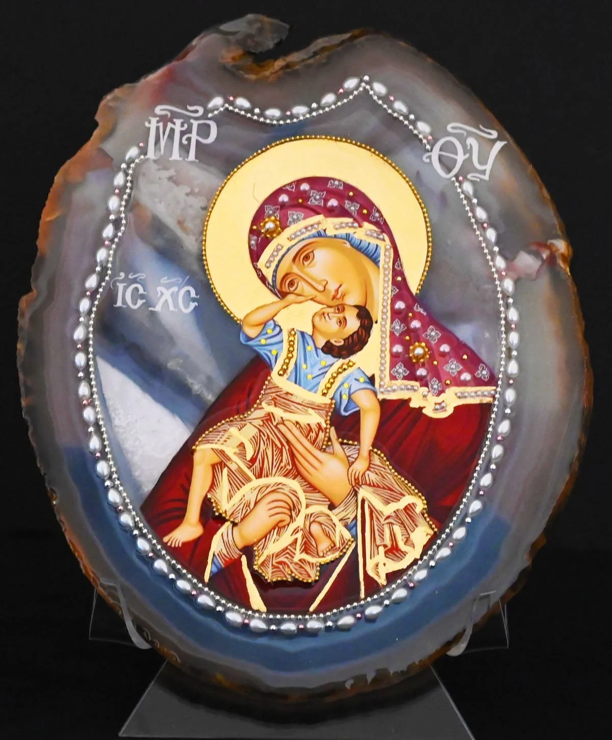 #AG9 PANAGIA LEAPING FOR JOY $195
DESCRIPTION: The icon is mounted on a natural grey toned Brazilian agate with shades of white and soft red  (8 ½ x 6 ¼ x ¼) 1.2 lbs.  The photostephano (halo) is hand gilded gold and encircled with a gold metal stran