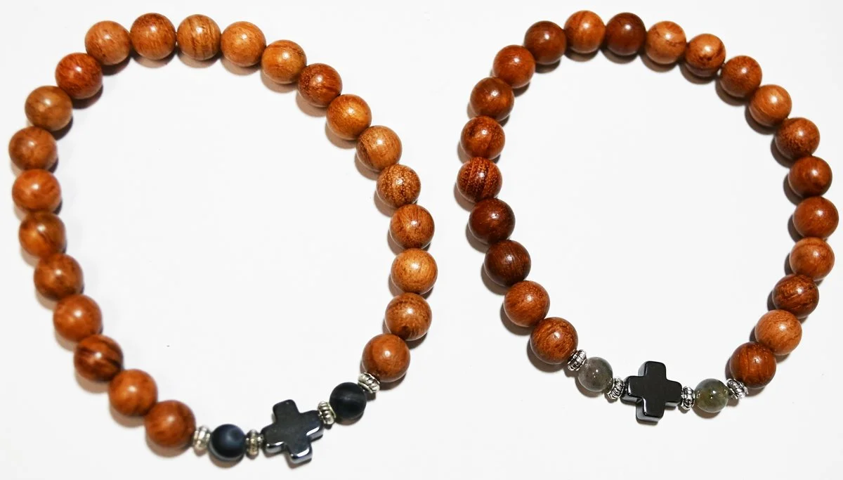#22 Toffee colored wood beads with black  gun metal grey cross