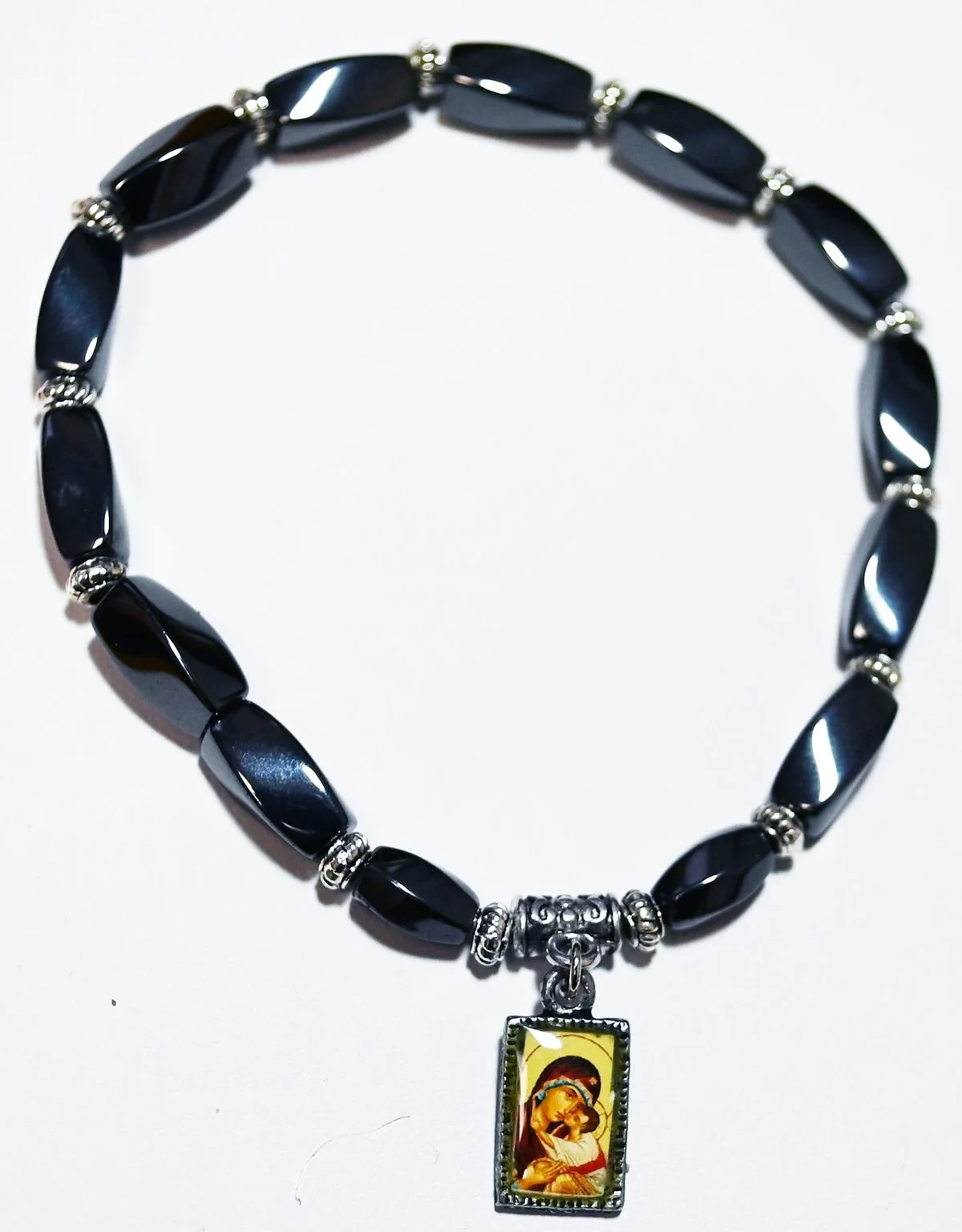 #13 --$26--- Beautiful dark grey hematite beads with only the icon of Guardian Angel.