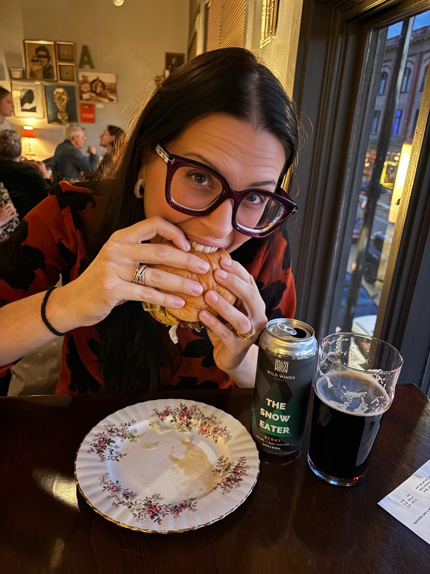Caught mid-bite at @raindogbar &mdash; and honestly, can you blame me? Their burger is an absolute must-try, especially when paired with our The Snow Eater &ndash; Stout. That rich roastiness and smooth finish were made for juicy burgers like this on