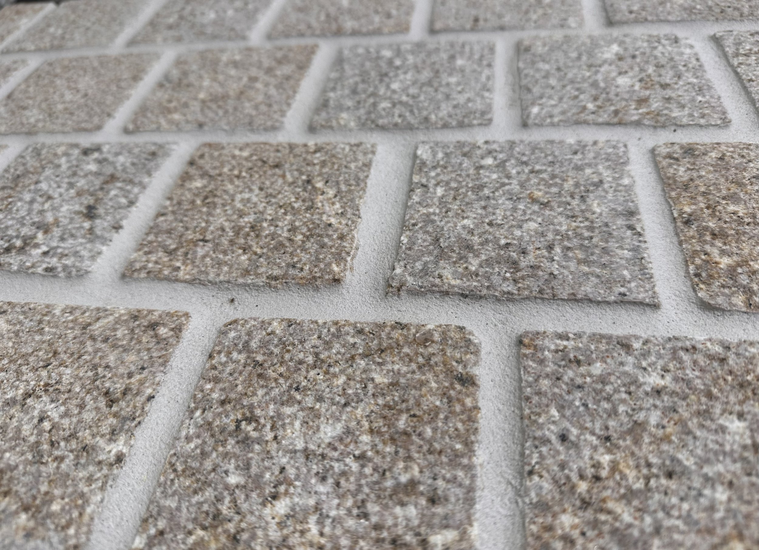 Honey Bush hammered Granite cobble Stone Collective .jpeg