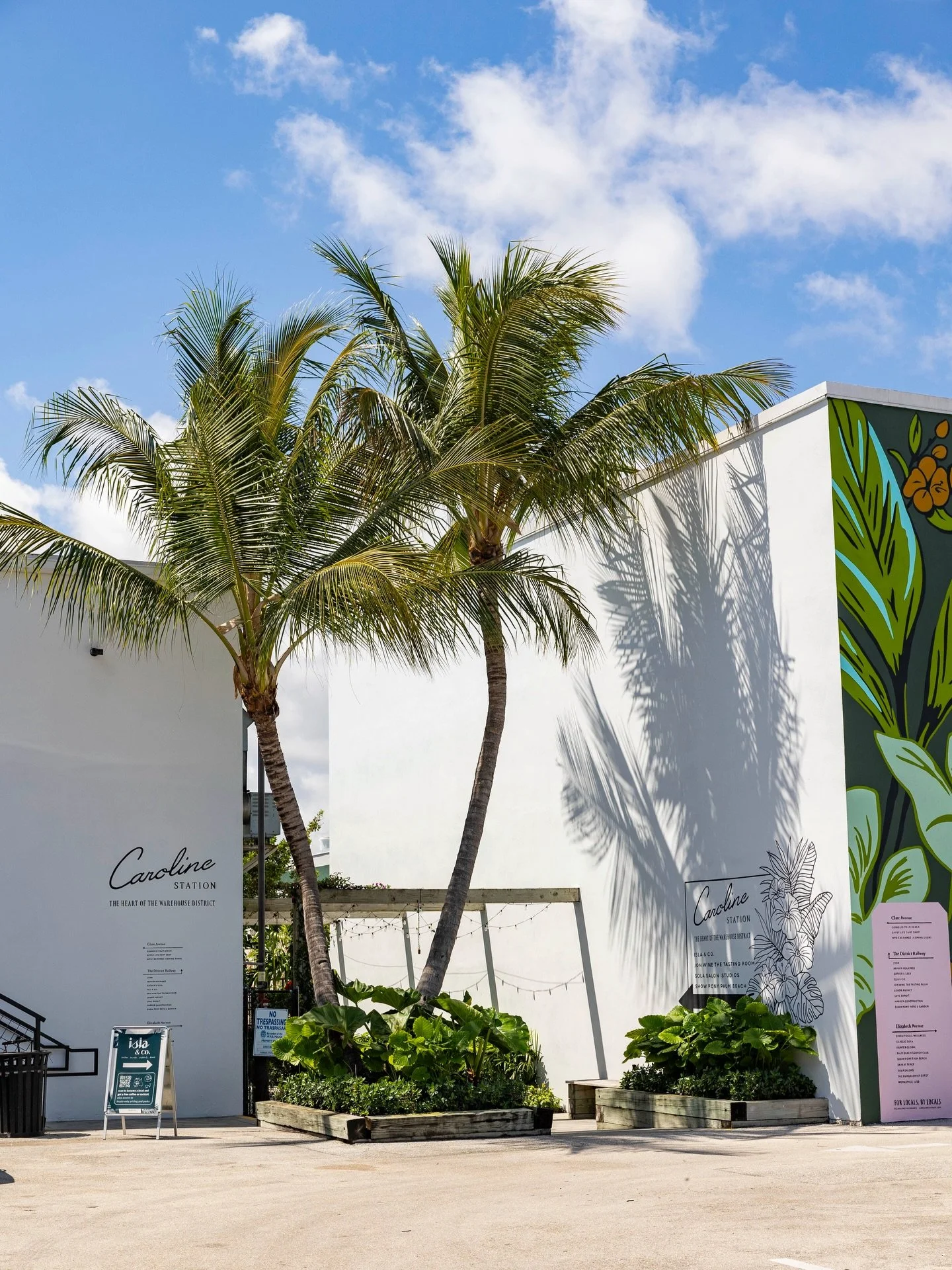 Sunny moments might be sporadic this week, but Caroline Station is still as green as ever. Palms, fresh landscaping, and open-air spaces ready and waiting for moments like this.