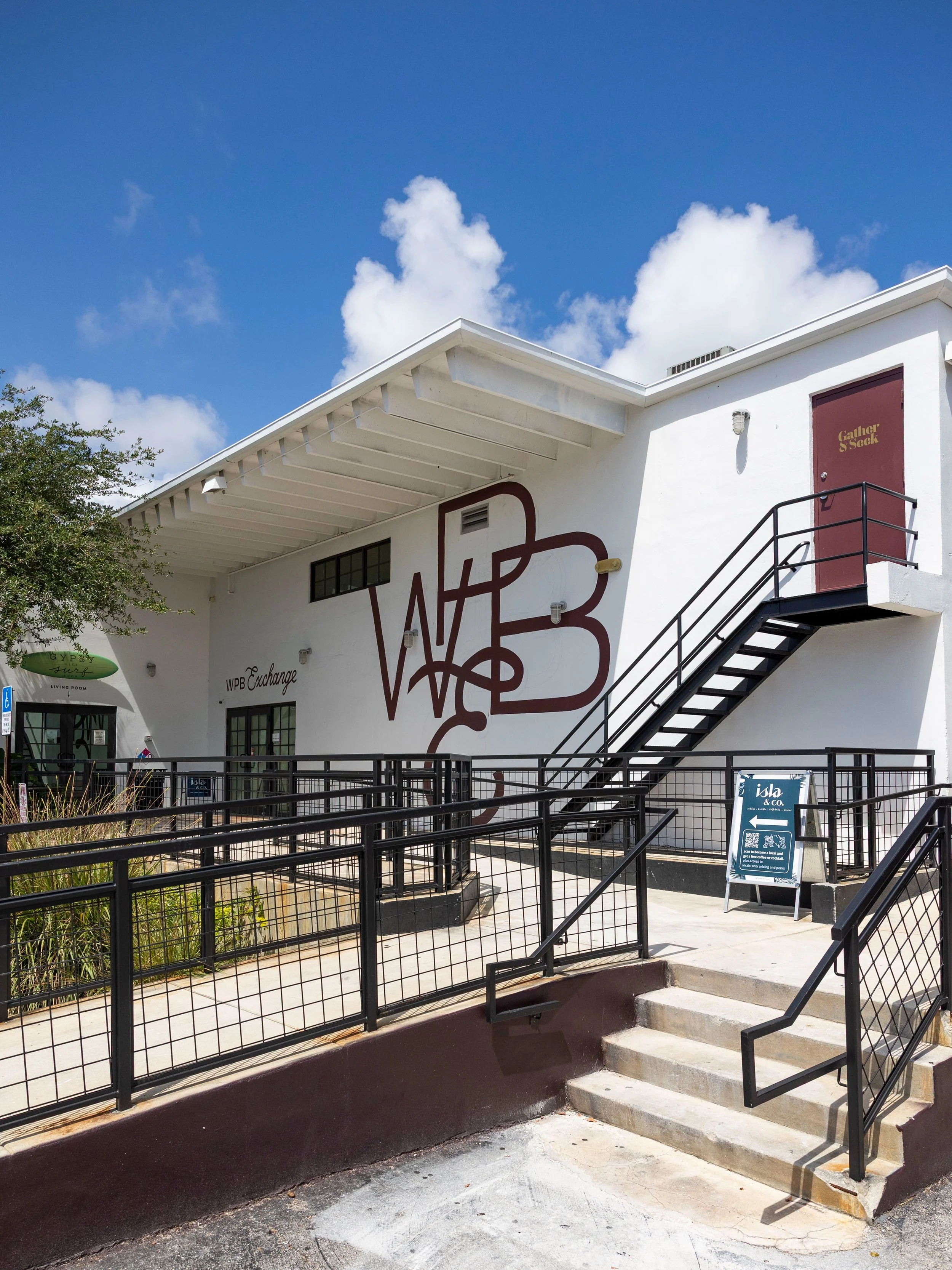 A first look at the exterior artwork at the West Palm Beach Exchange &mdash; bold, local, and unmistakably WPB. The colors and details are starting to hint at what&rsquo;s coming inside. 

The branding, logos, and artwork are the work of @gatherandse