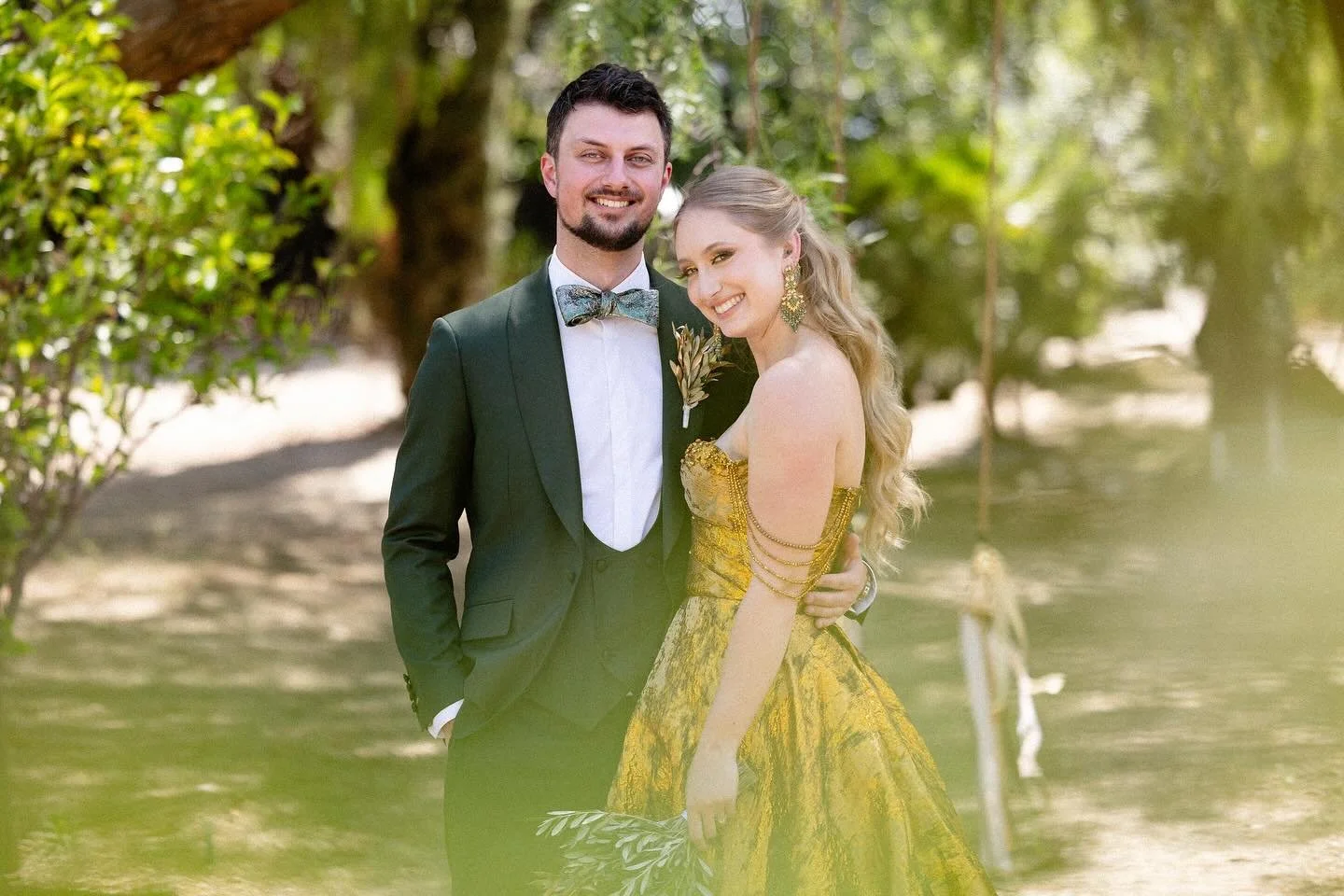 Our gorgeous bride is absolutely radiant in her one-of-a-kind gold wedding dress ✨💛 We had the honor of creating her wedding day glam &mdash; a flawless half-up, half-down hairstyle paired with a soft, bold glam makeup look that perfectly complement