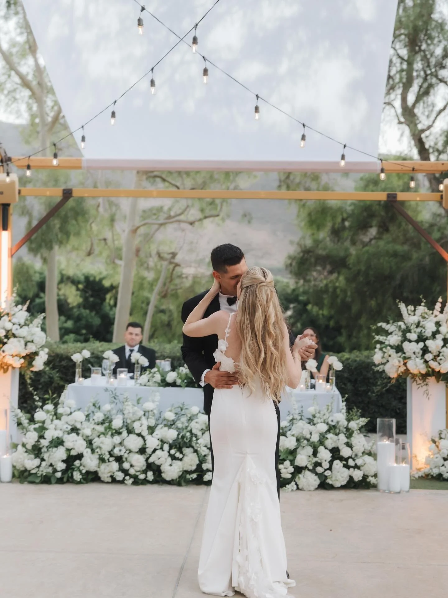 There is nothing more magical than a first dance as husband and wife 🤍Such a beautiful, timeless moment captured here.

For our stunning bride, we created an elegant half-up, half-down style with soft, modern curls, classic, romantic, and effortless