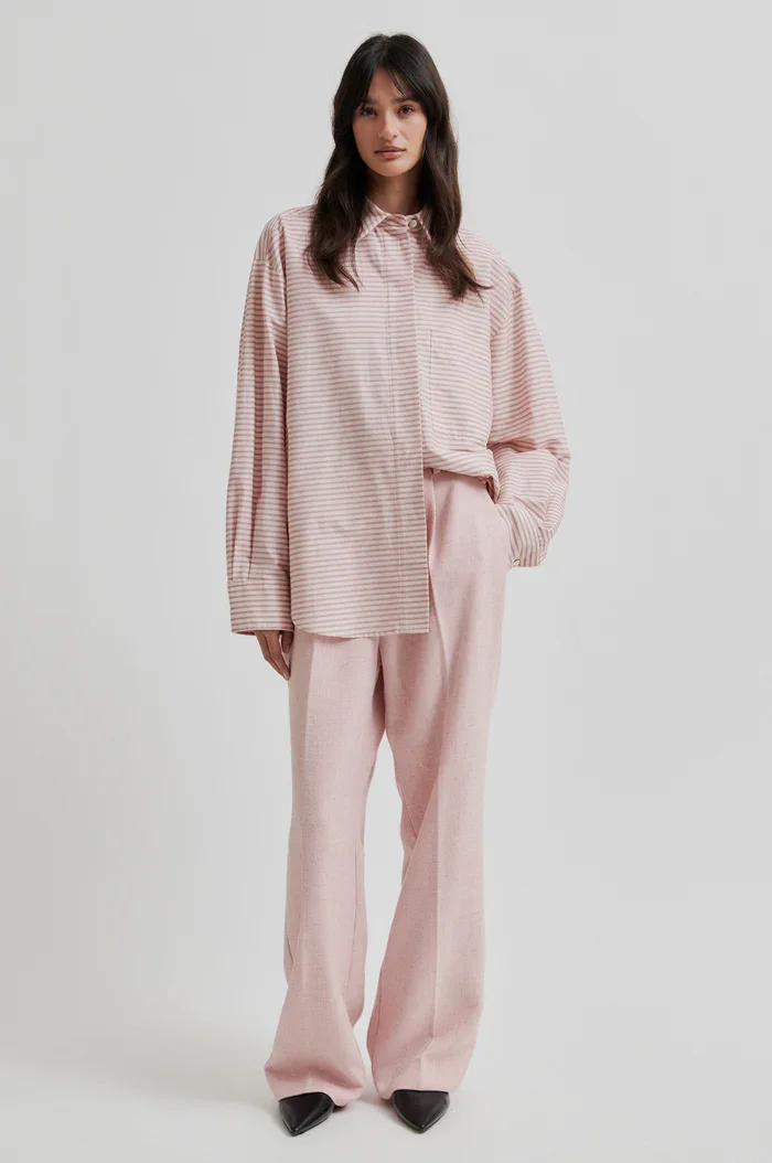 SECOND FEMALE | PALE PINK PANTS.