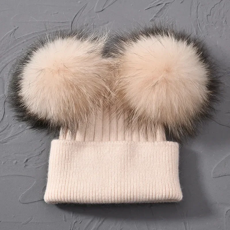 CREAM CASHMERE BEANIE WITH DOUBLE RACCOON POMPOM.