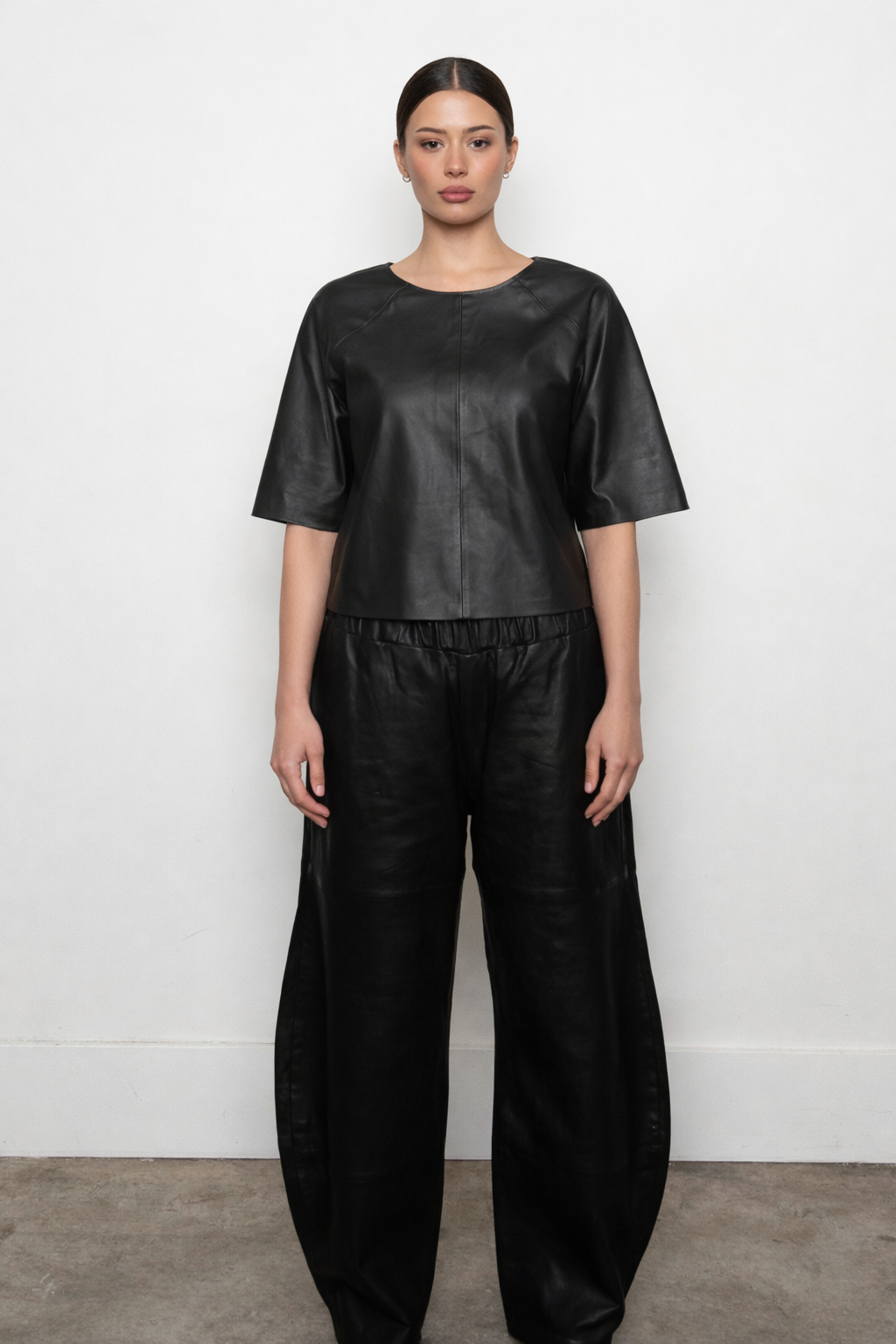 DEA | BLACK LEATHER RAGLAN SLEEVE TOP.