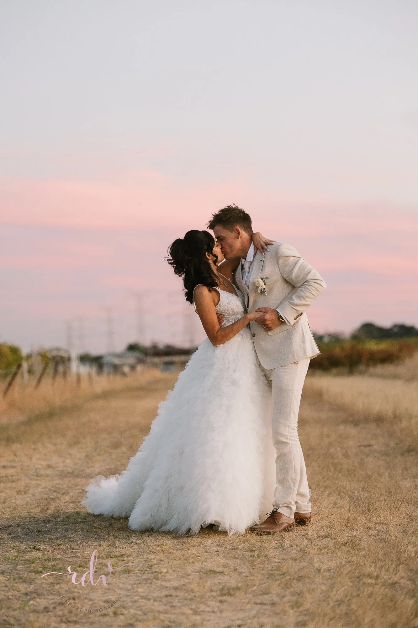 Perth Wedding Photography. Bride and Groom at sunset in the Swan Valley