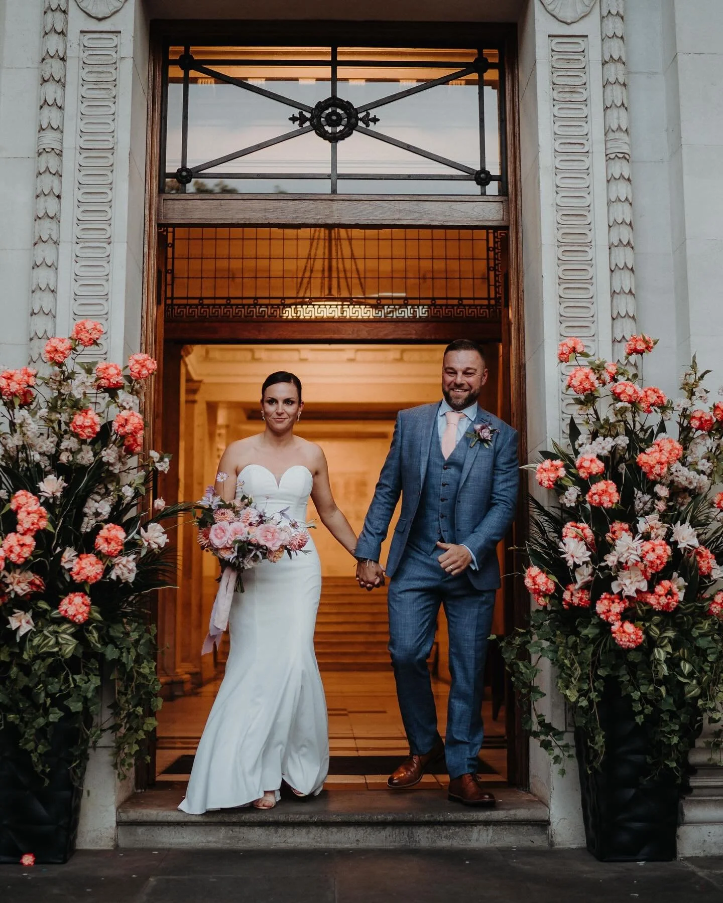 Laura &amp; Kevin at the Marylebone Town Hall in London. A lovely ceremony with their nearest and dearest followed by a small reception dinner at The Italian Greyhound. All the beaut! 

Venue: @greyhoundmarylebone 
Flowers: @hollyandthedragonfly 

#m