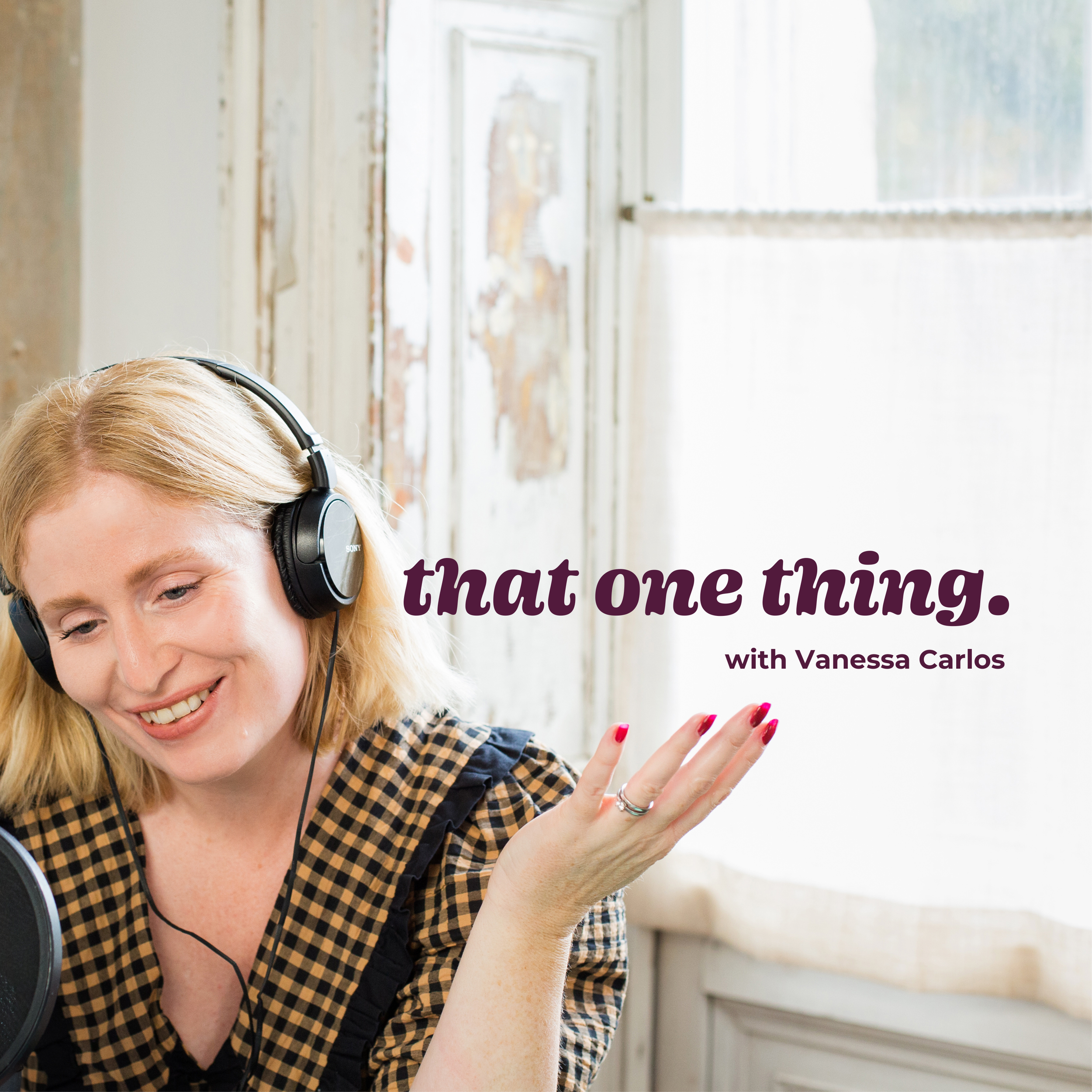 A woman with blonde hair, wearing headphones and a checkered shirt, smiling and gesturing with her hand, in a studio with a rustic background. Text on the image says, 'that one thing.' with Vanessa Carlos.
