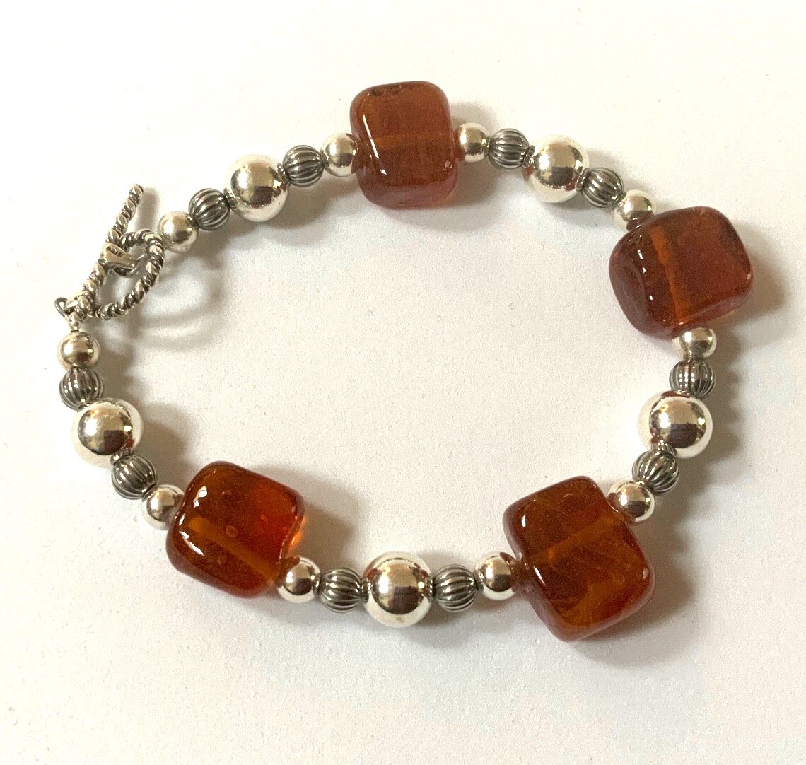 Amber Glass and Silver Bracelet