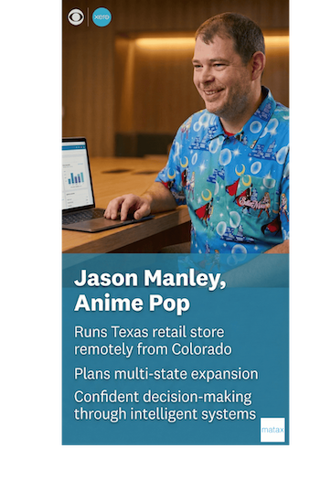 Professional photo of small business owner, Jason Manley, using technology