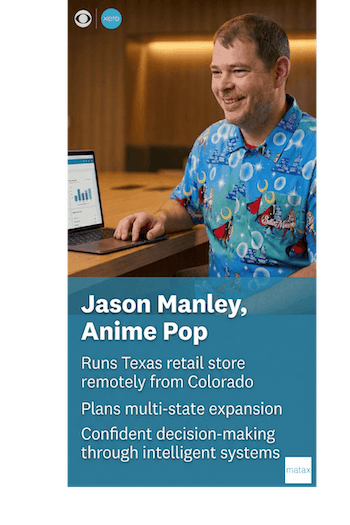 Professional photo of small business owner, Jason Manley, using technology
