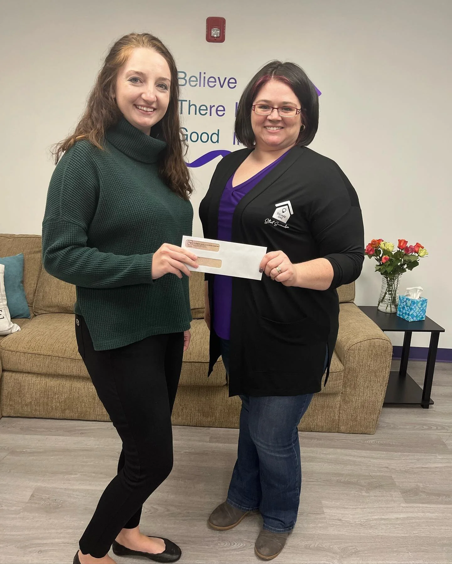 Last Friday Farmers Bank attended the open house and toured the facility of Square One, a domestic violence and homeless shelter located in Gallipolis, Ohio. Pictured is Kylie Haislop of Farmers Bank who presented a check of $250 to Ashley Durst of S