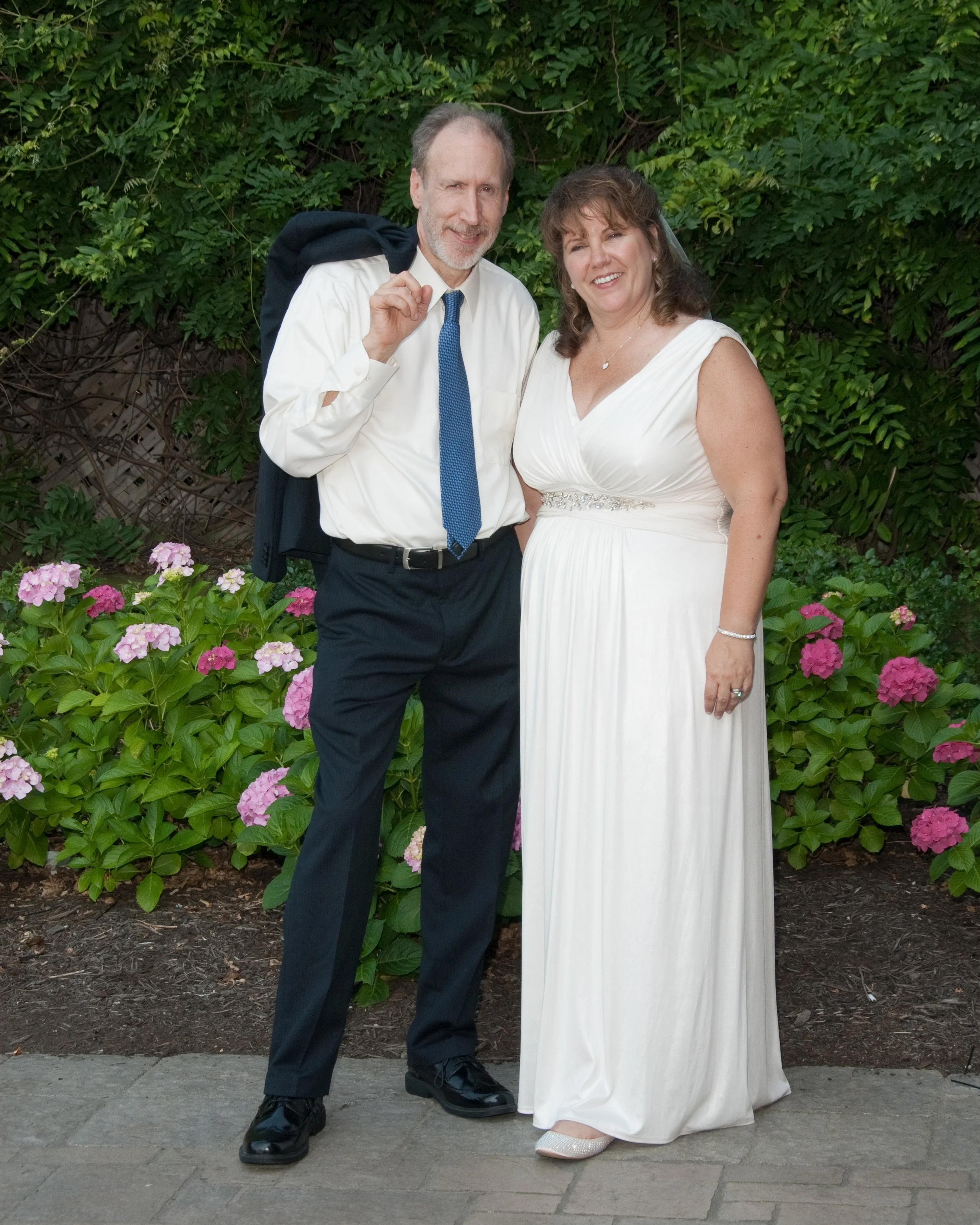Cleveland Ohio wedding photographer Bill Morley on his wedding day with his wife at Windows on the River