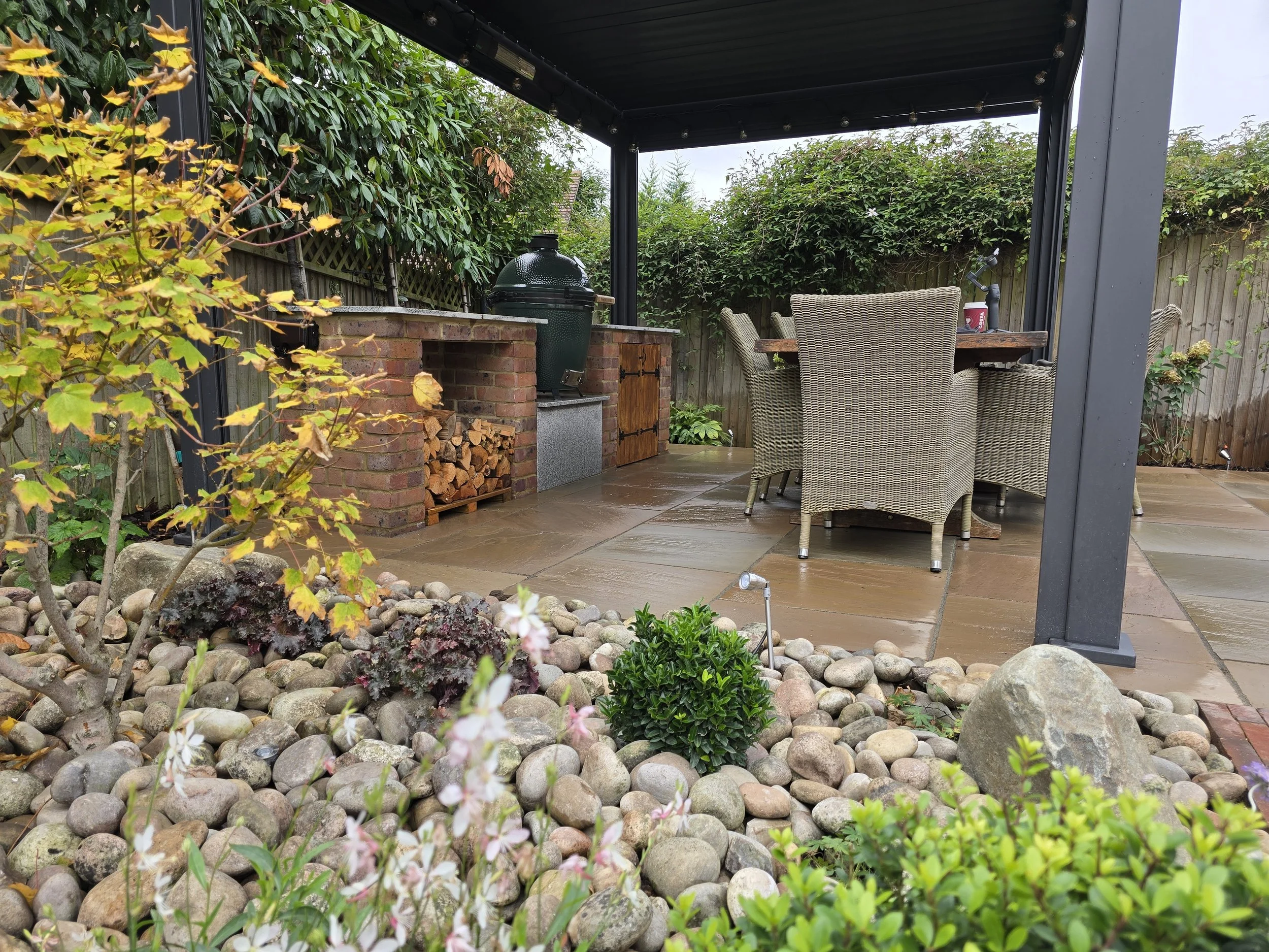 Acer, Boulders, Cobbles and Plants a Craig styling favorite.