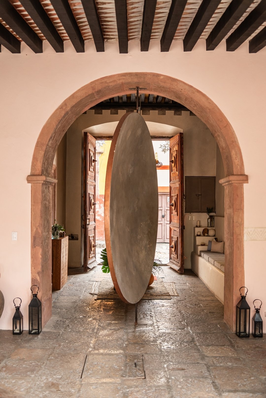 Cross the threshold of our enchanted moon door, a portal whisking you away from the lively streets of San Miguel de Allende to our serene zen courtyard. Within this tranquil oasis, surrender to the soothing embrace of serenity as your worries dissolv