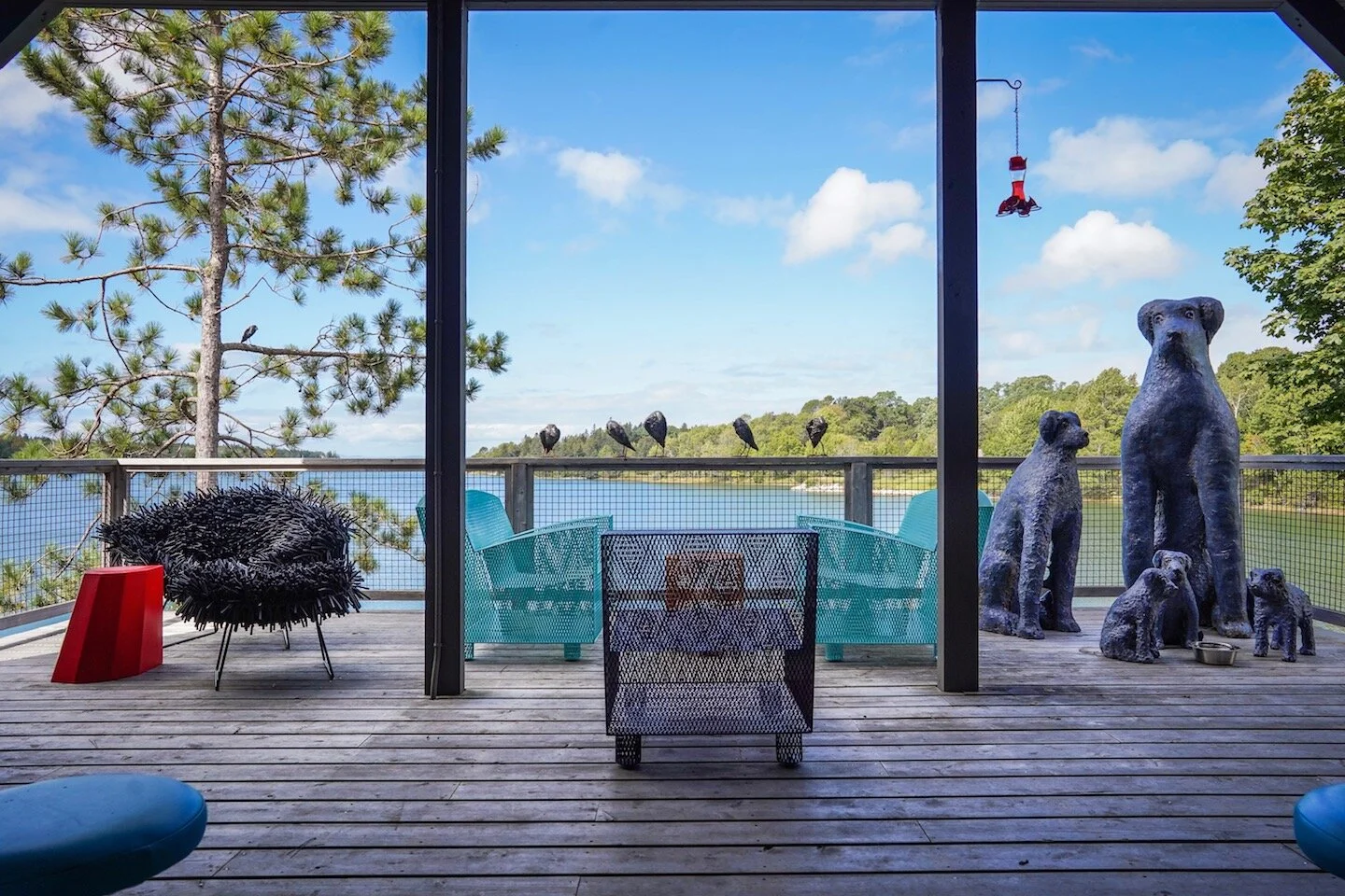 The deck at Devta Doolan Studio with furniture and sculptures