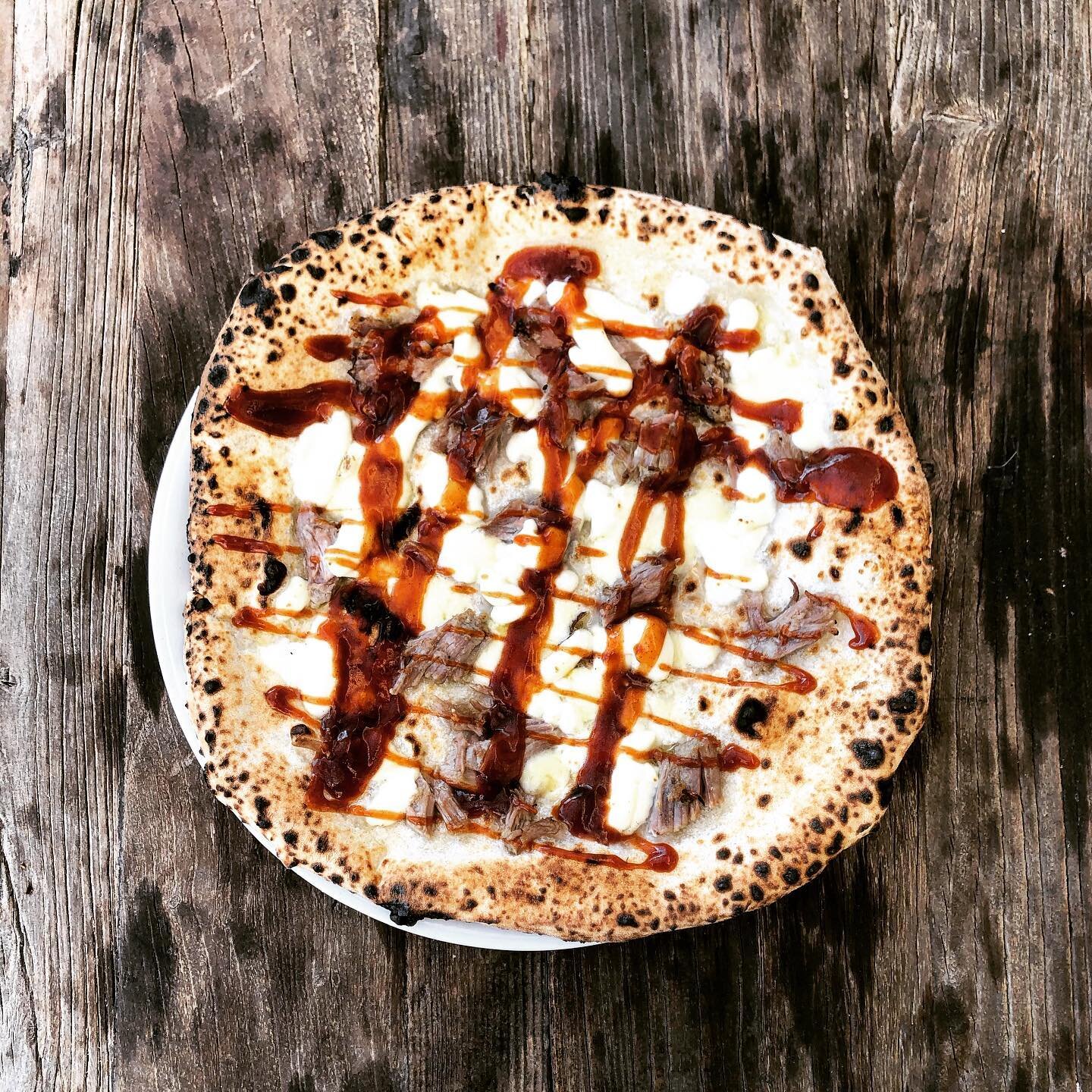 New special is here and this one is something we have never done before!! ⁣
⁣
BBQ Pulled Pork Pizza!! ⁣
⁣
Sous vide smoked Pulled Pork, BBQ Sauce drizzle, Fontina, Mozzarella, &amp; Olio⁣
⁣
It&rsquo;s seriously delicious