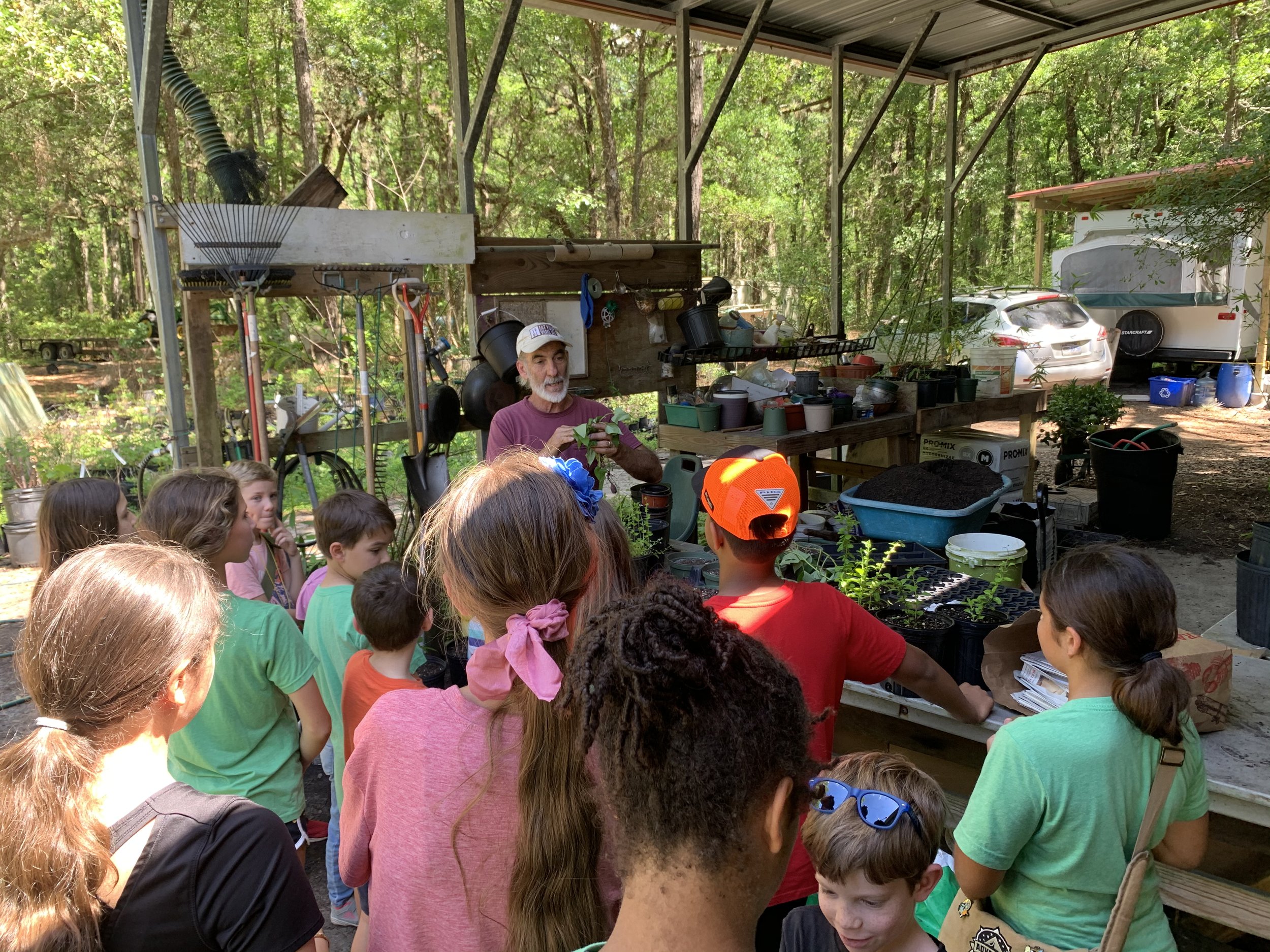 potting bench with children.jpg