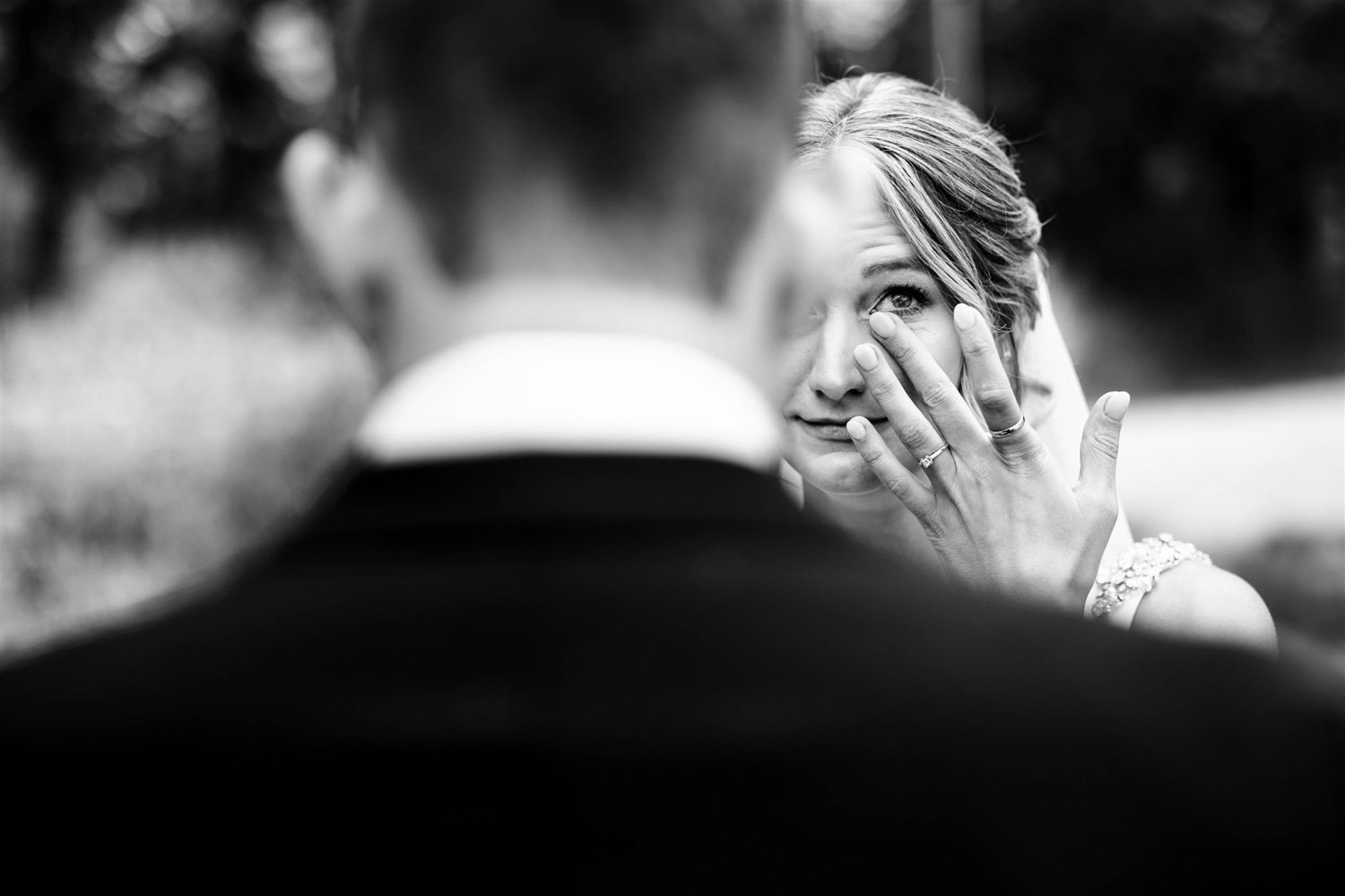 Bride-wipes-away-a-tear-during-emotional-private,-though-reading-at-Pinecrest-wedding.jpg.jpg