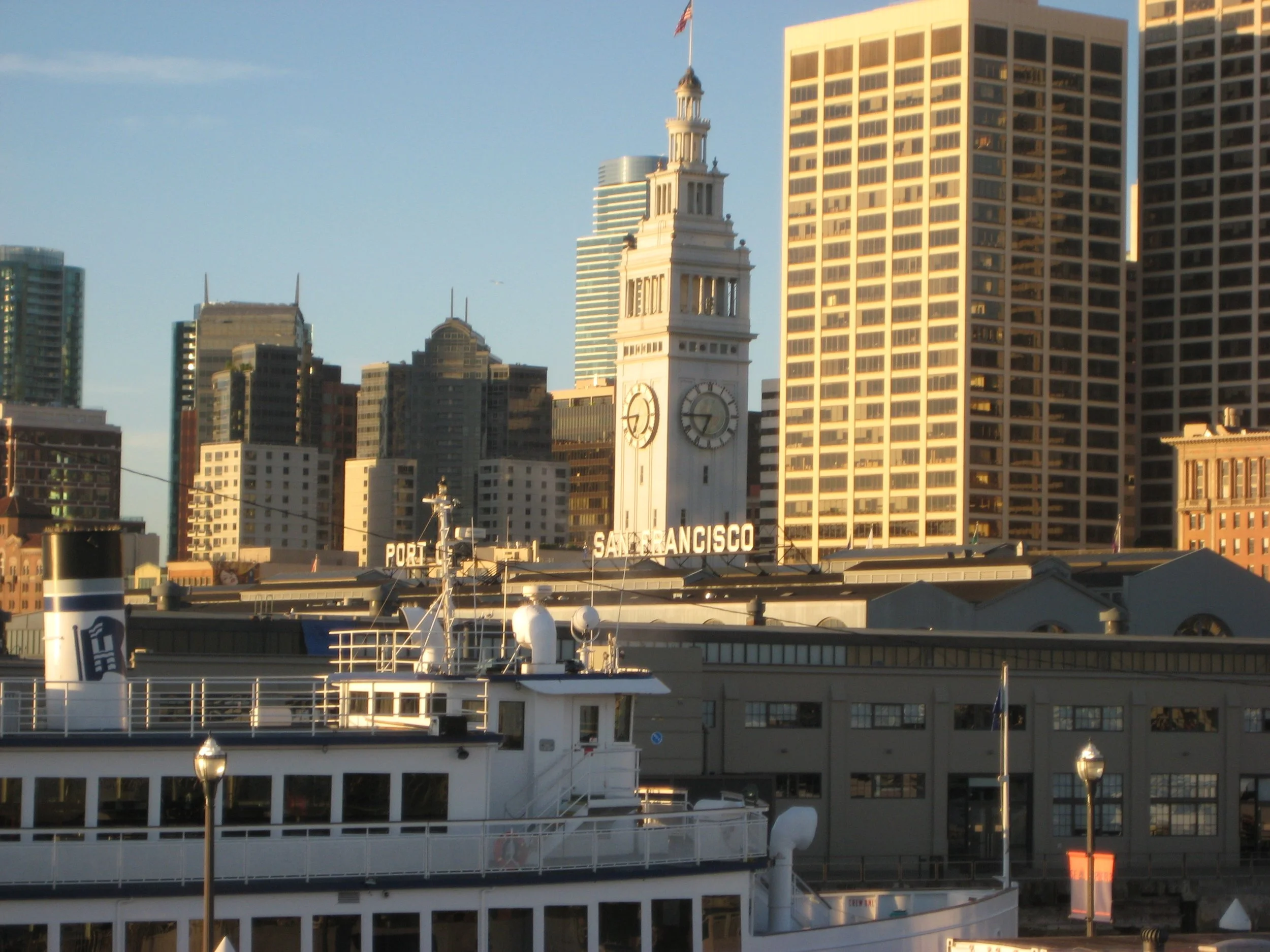 Ferry Building clock tower in golden evening light on the San Francisco waterfront