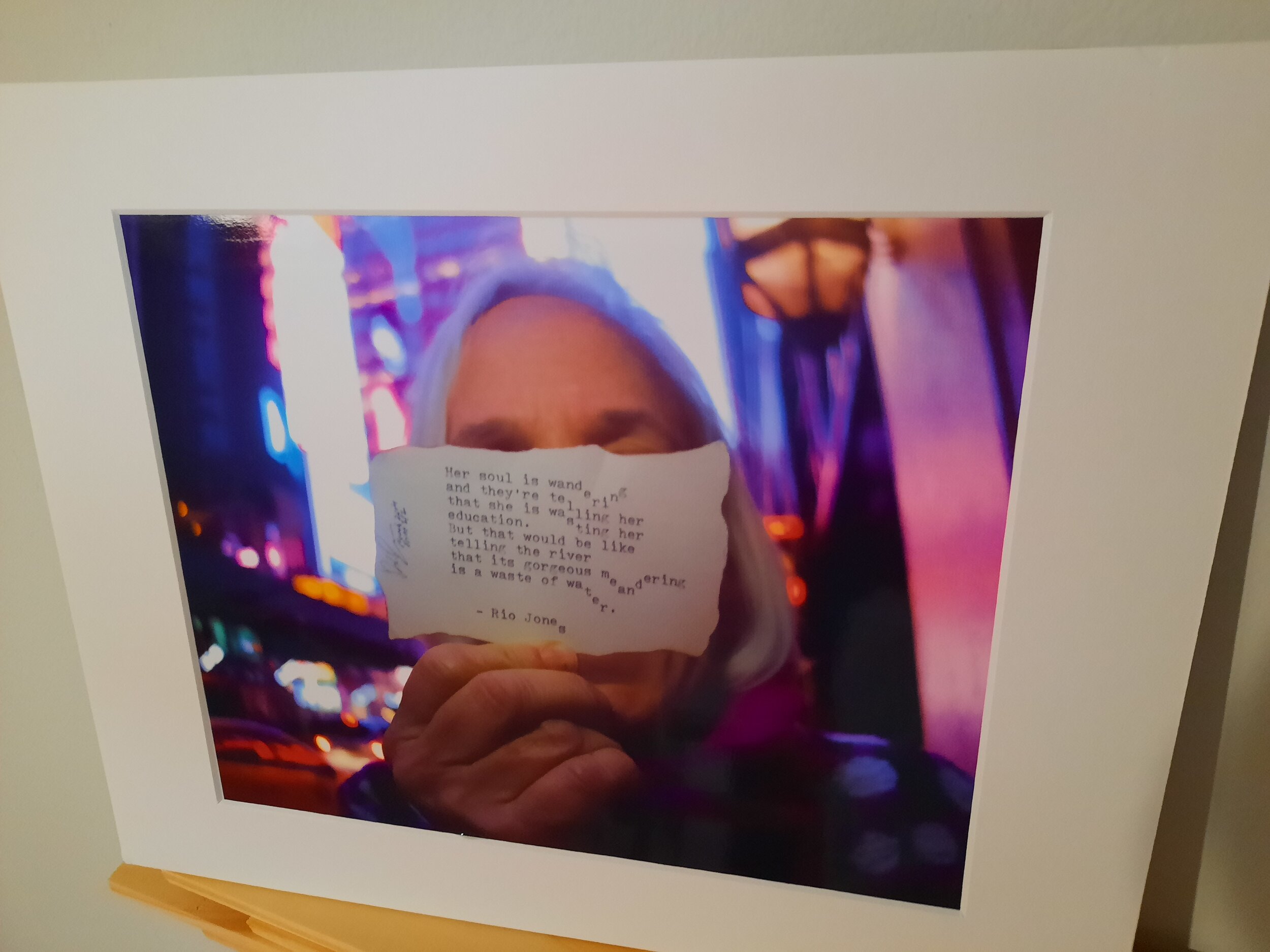 "Holding 'She Is Wandering' Poem in the City"