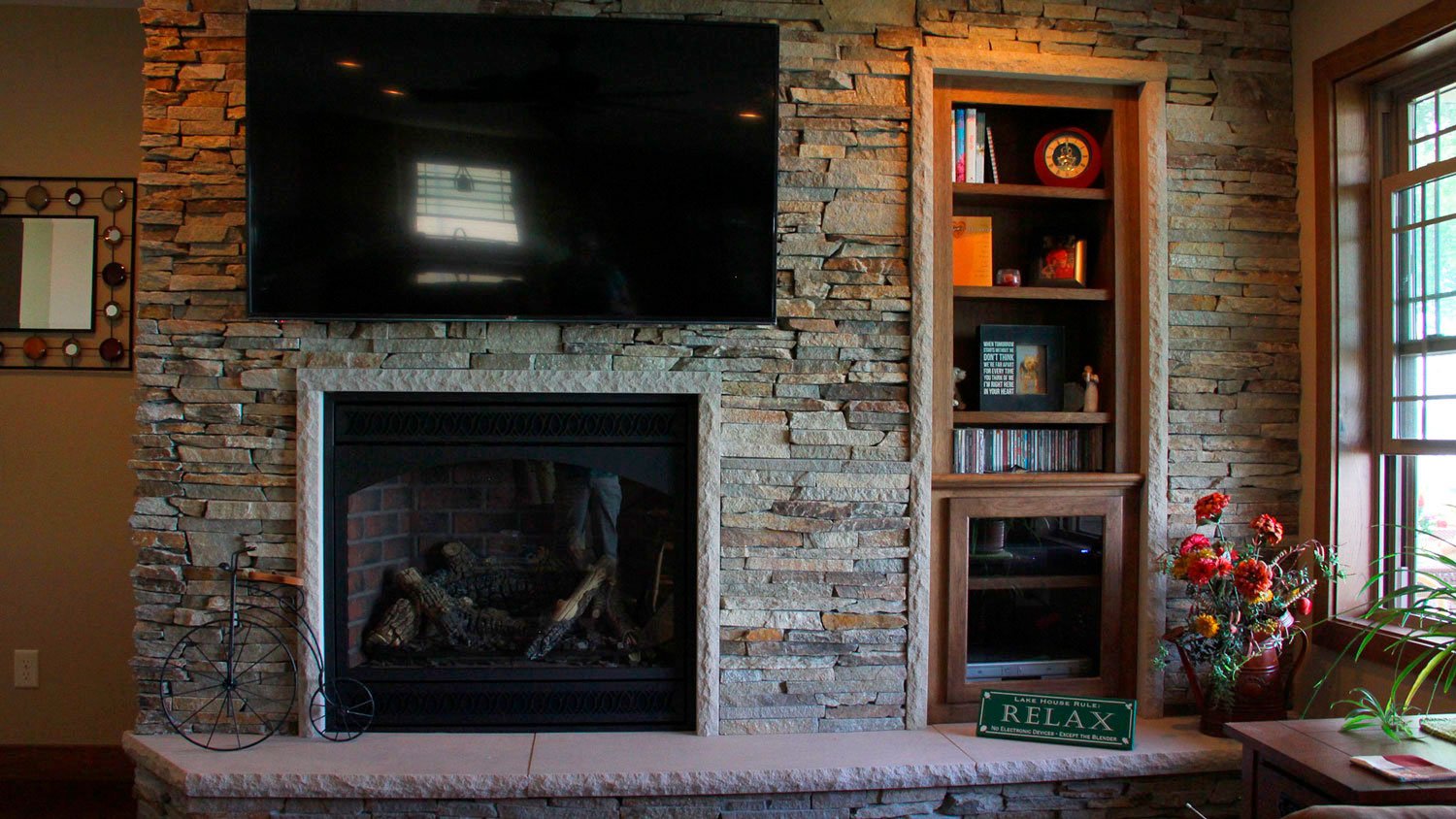 Large Shelving in Custom Nook Beside Existing Fireplace